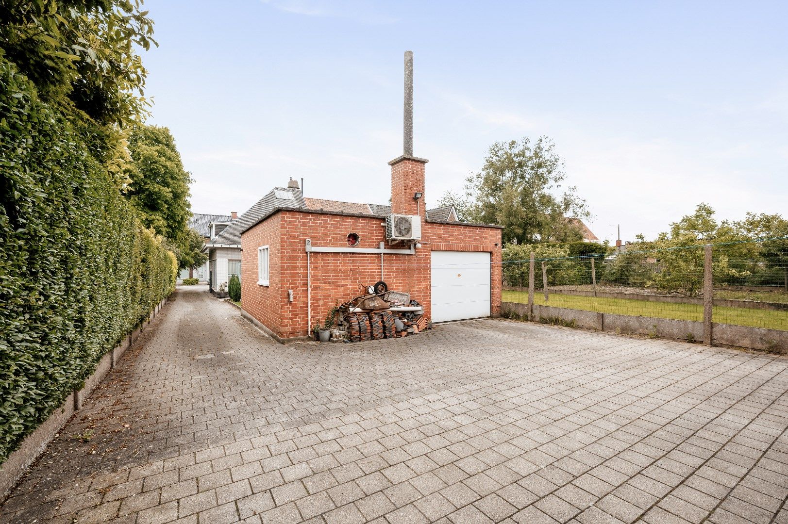 Halfopen woning met tuin, garage en loods 140m² foto 23