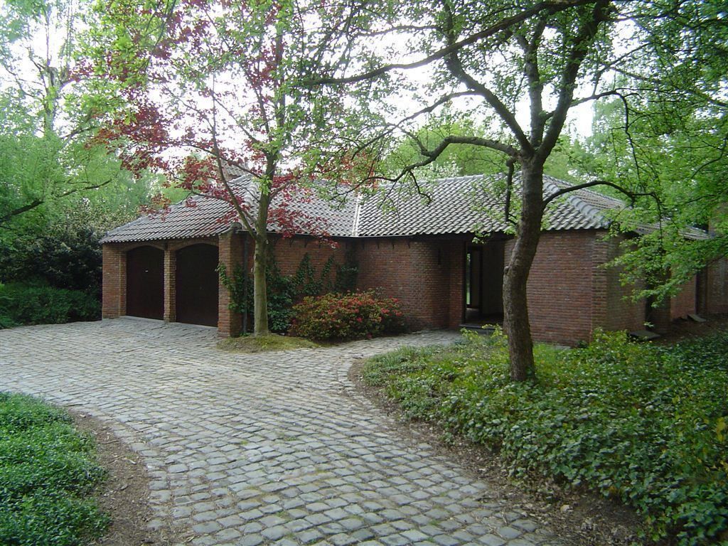 Villa alles gelijkvloers foto {{pictureIndex}}