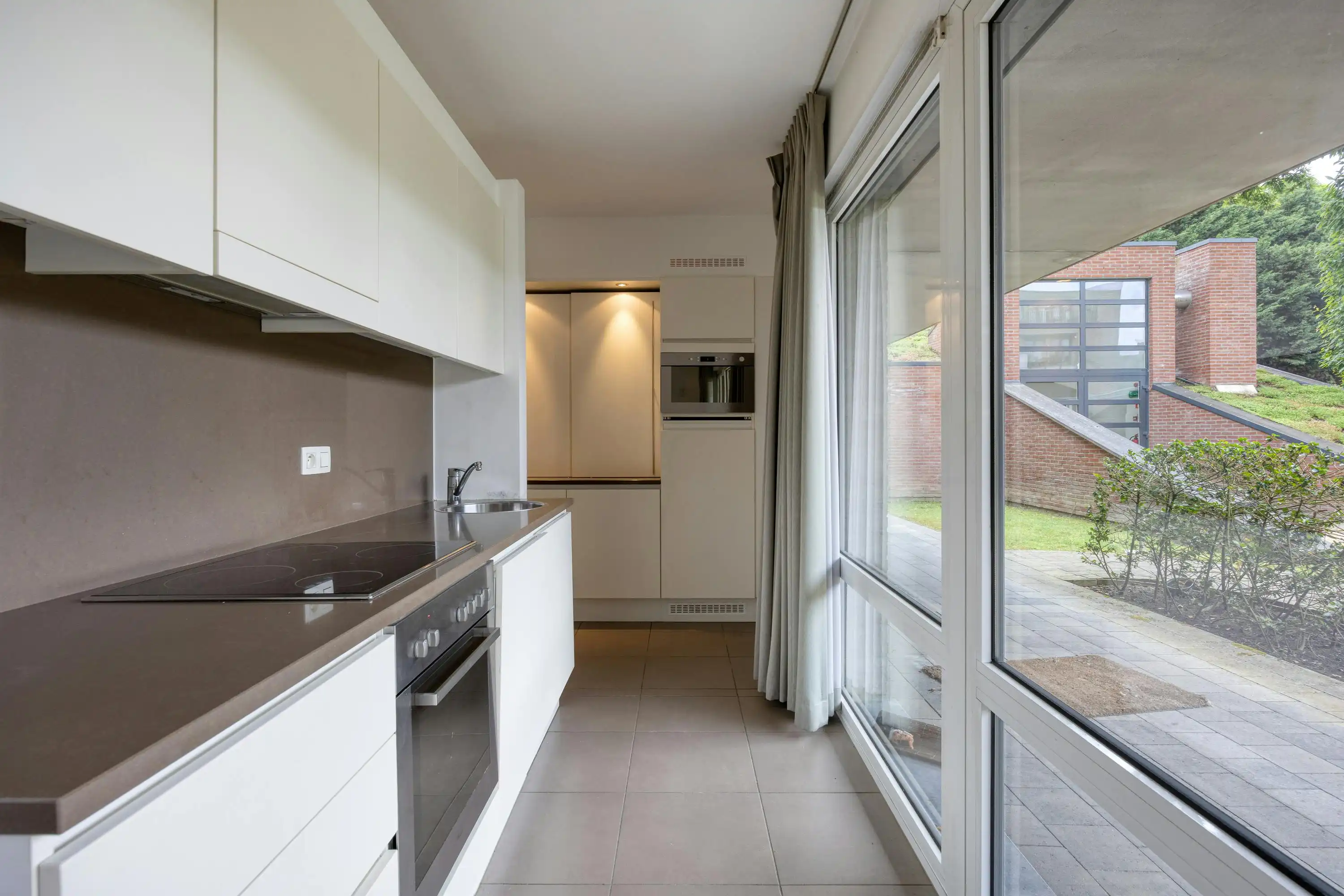 Assistentiewoning met terras en ondergrondse autostaanplaats foto 6