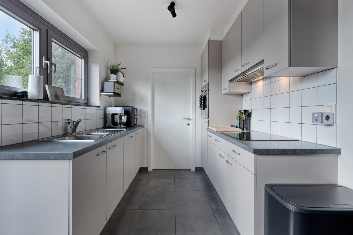 Instapklare en lichtrijke duplex met terras, garage én drie slaapkamers foto 13