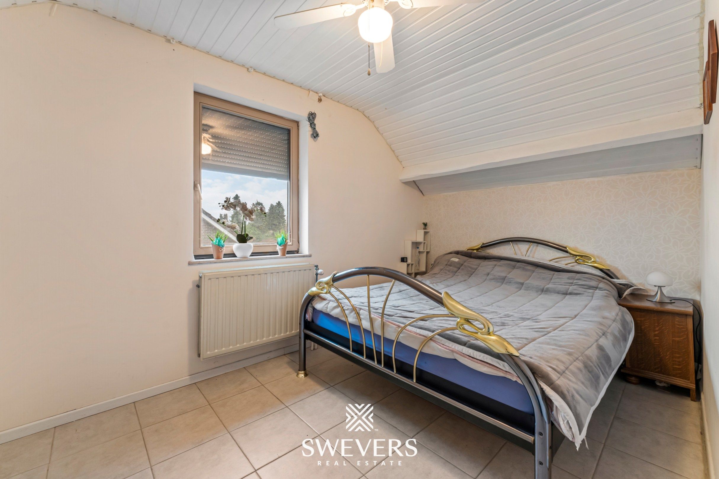 Instapklare open bebouwing met zuidgerichte tuin nabij het centrum van Heusden foto 16