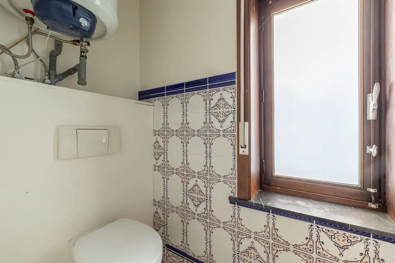 Vier slaapkamers. Twee staanplaatsen. En achteraan een verrassende buitenplek met zuiderse patio-sfeer foto 44