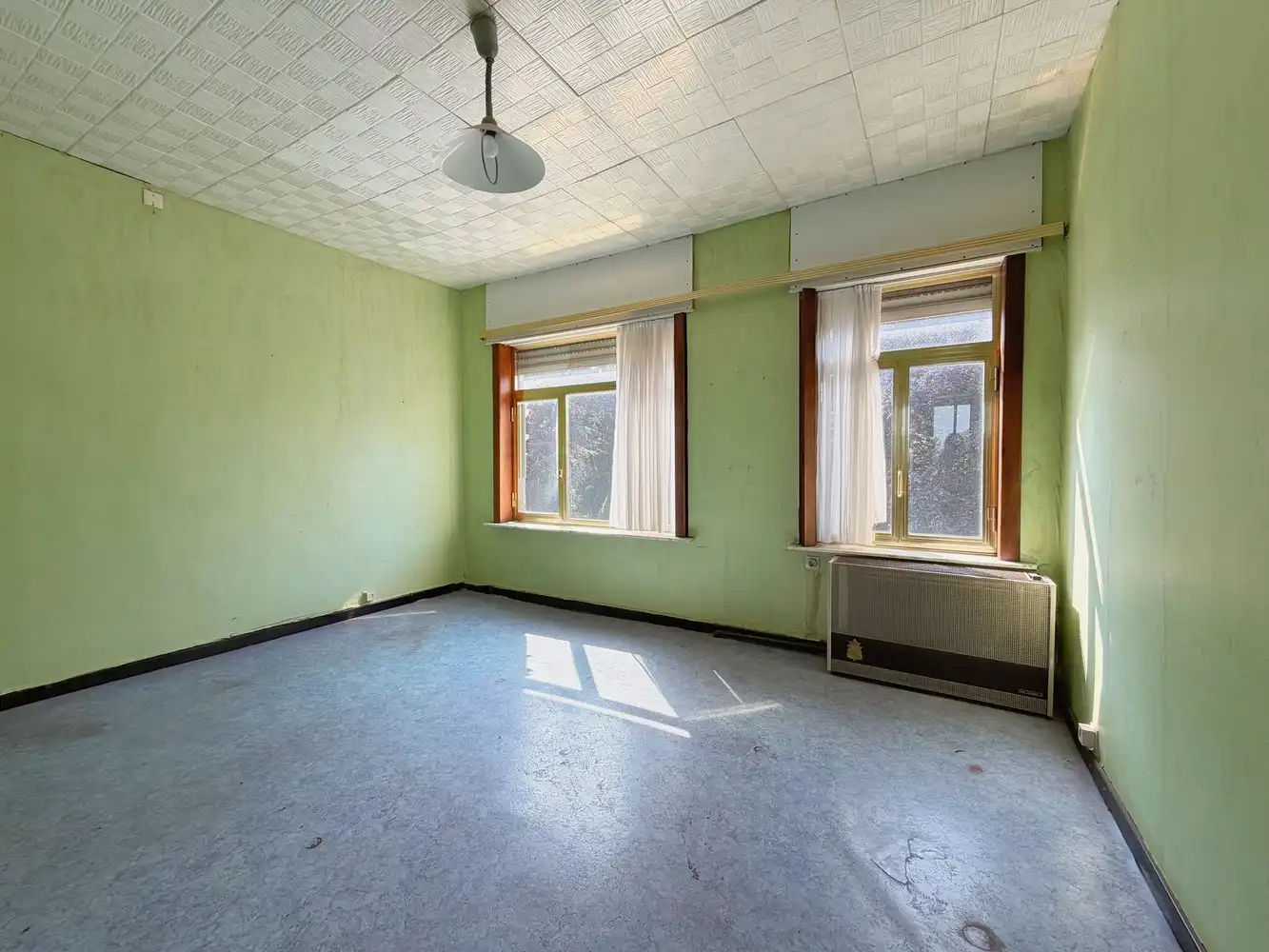 Ruime woning met polyvalente ruimte, zonnige tuin en tal van mogelijkheden foto 12