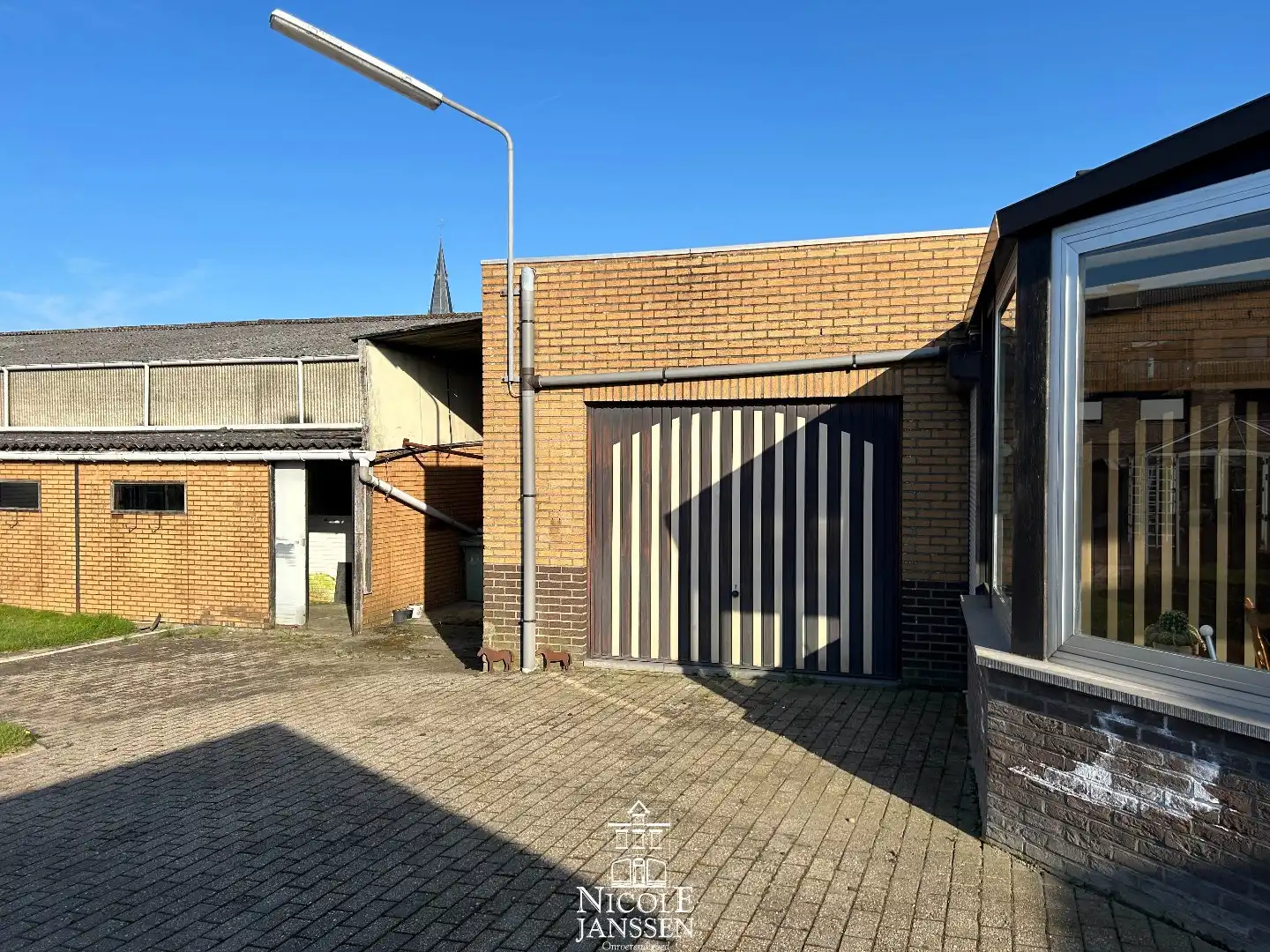 Verzorgde gelijkvloerse woning met tuin in verzorgde straat in centrum van Dilsen foto 20