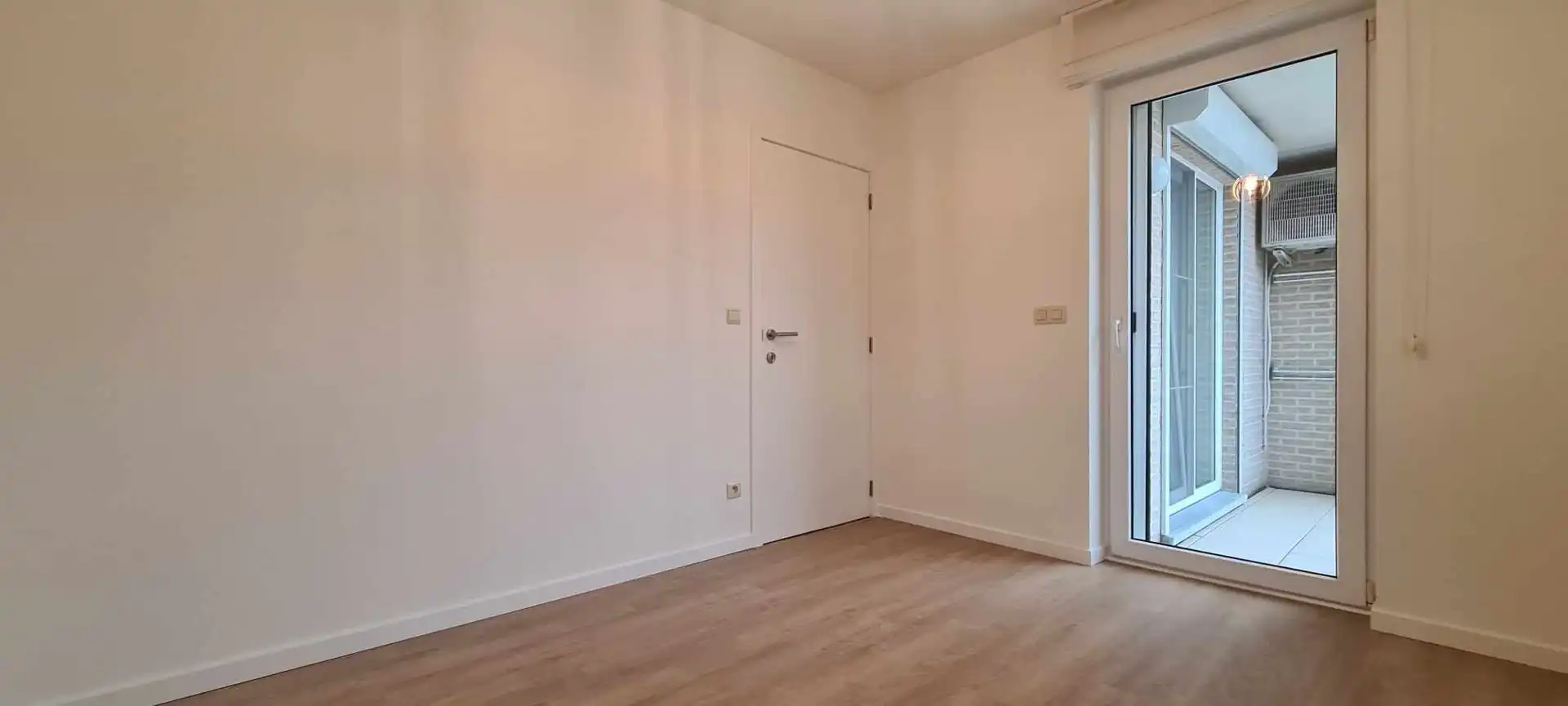 Charmant 2 slpk-appartement met autostaanplaats in residentiële buurt foto 10