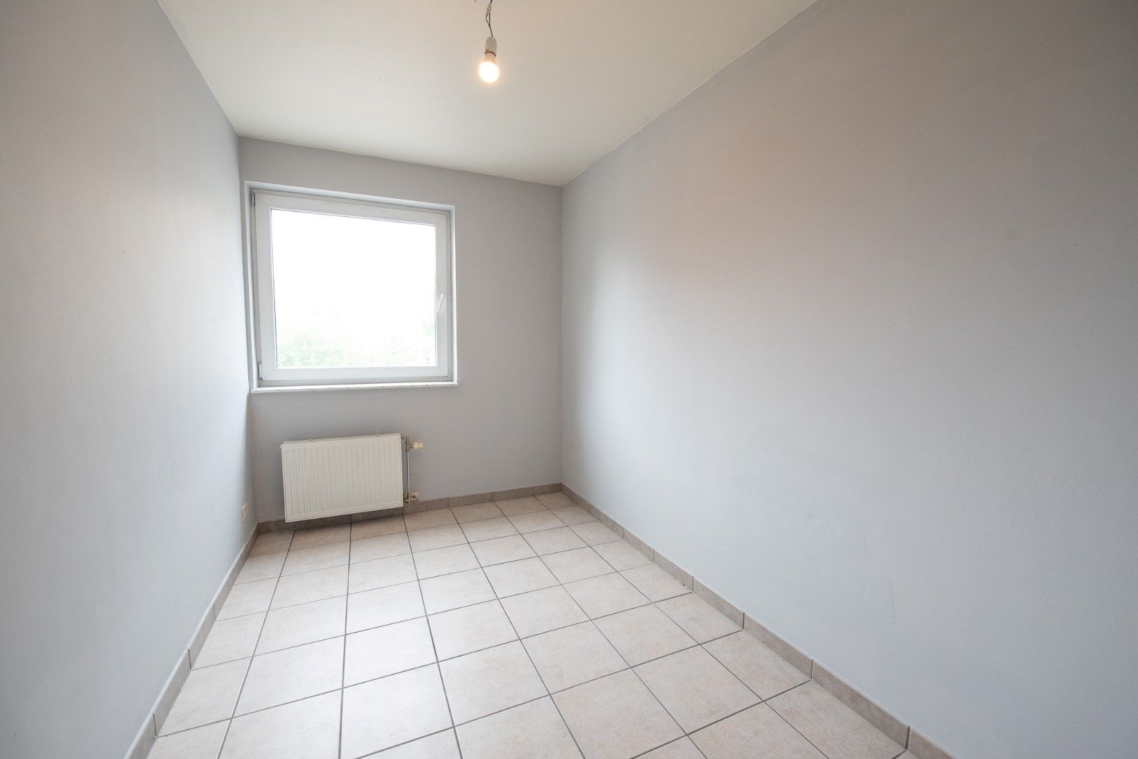 Ruim lichtrijk appartement met 2 slaapkamers en garage te Olsene. foto 15