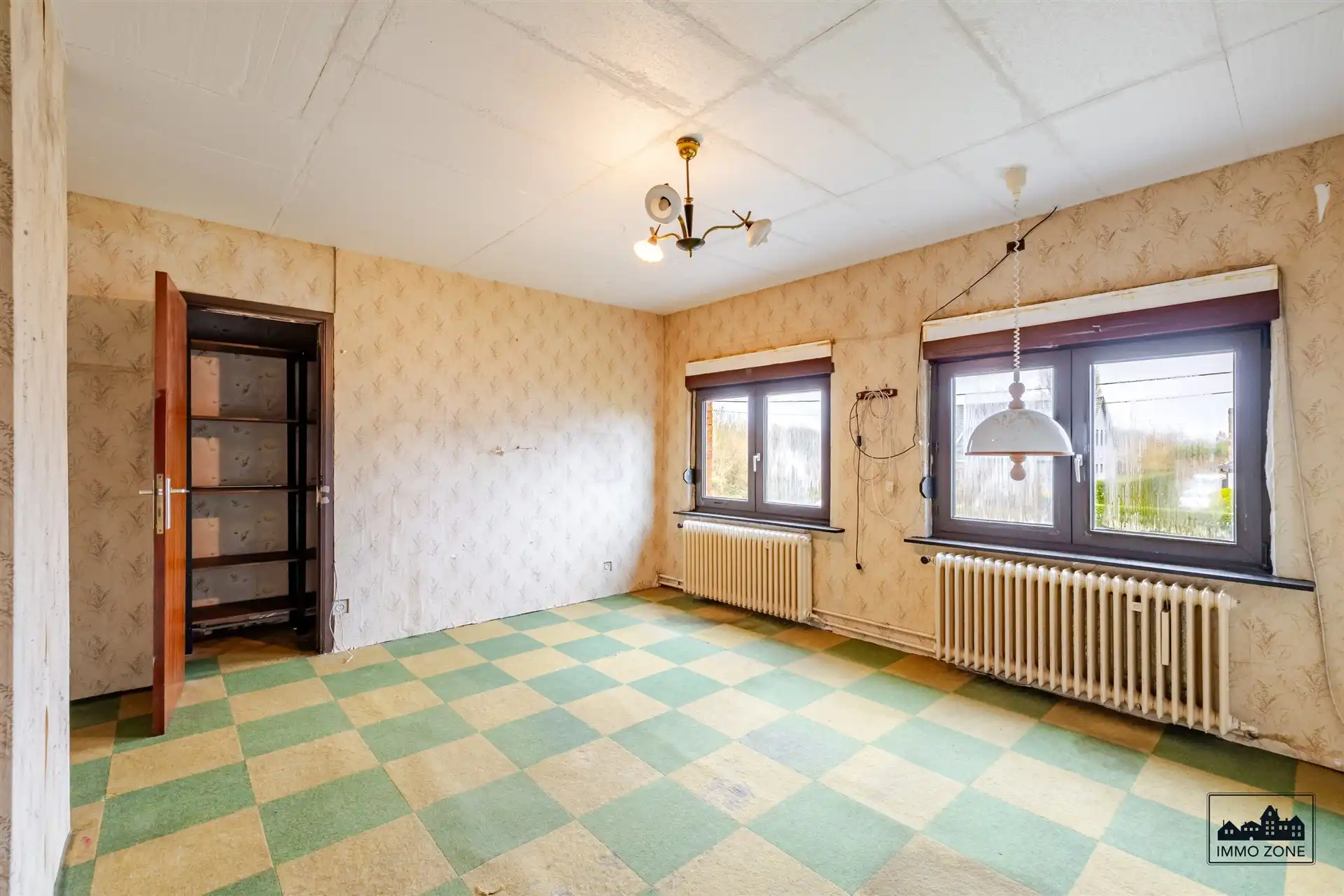 Te renoveren woning op ruim perceel met groene zone foto 12