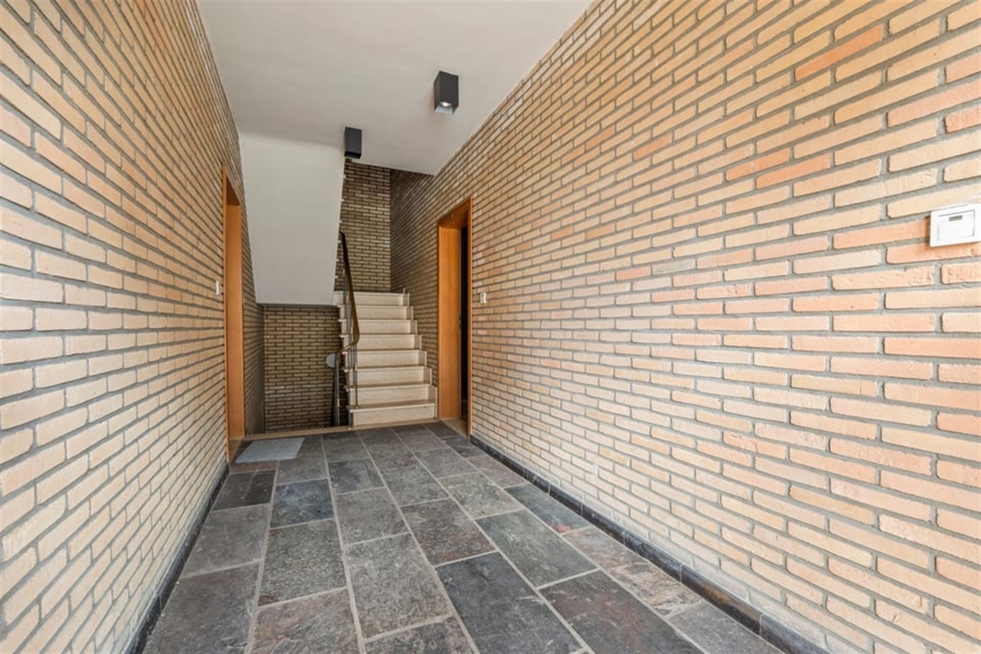 OPBRENGSTEIGENDOM MET 6 APPARTEMENTEN EN 4 STAANPLAATSEN IN SINT-TRUIDEN  foto 8