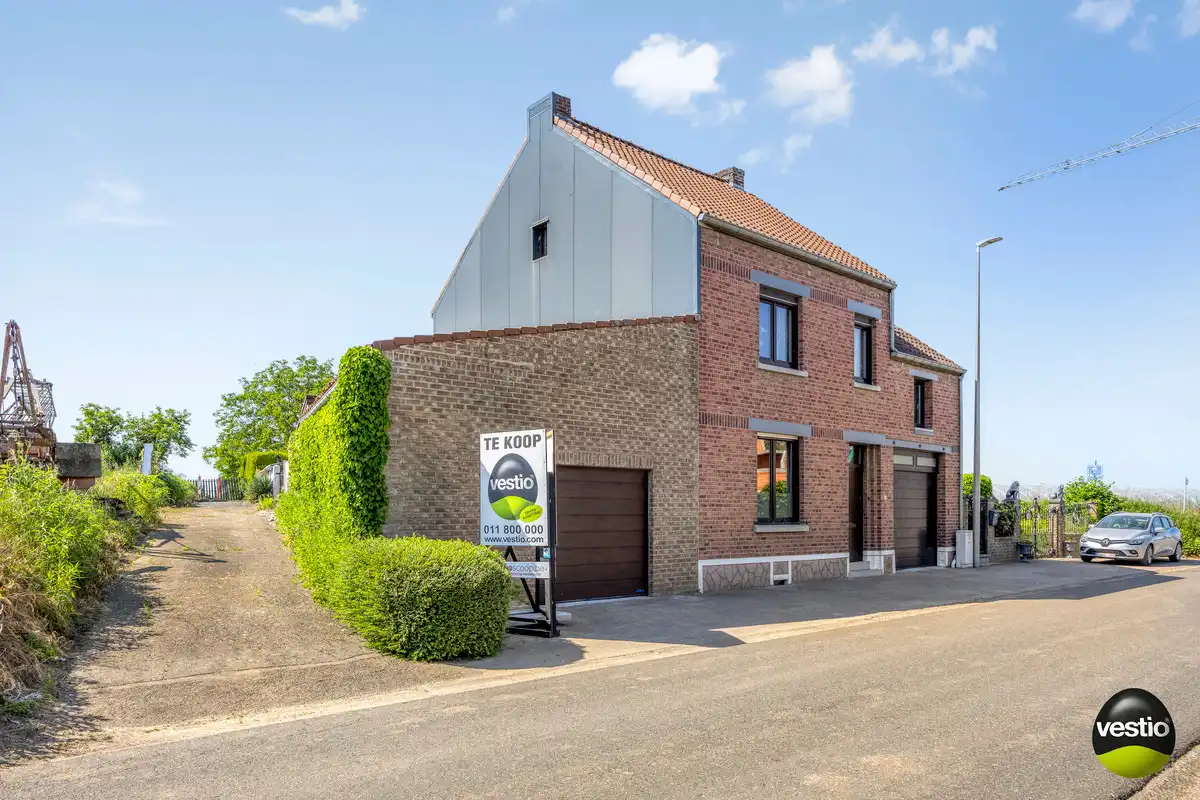 RUSTIG GELEGEN WONING MET ZORGWONING OP CA 15A TE BORGLOON. foto 32