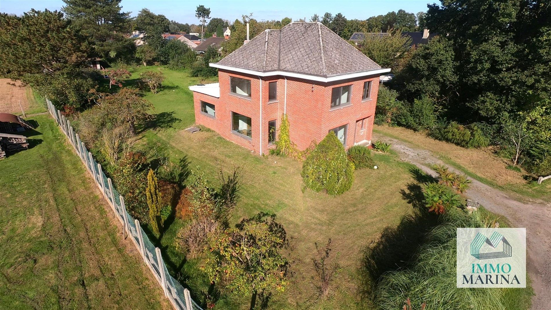 Zeer rustig gelegen af te werken woning op 21a te Tremelo (Baal) foto 1