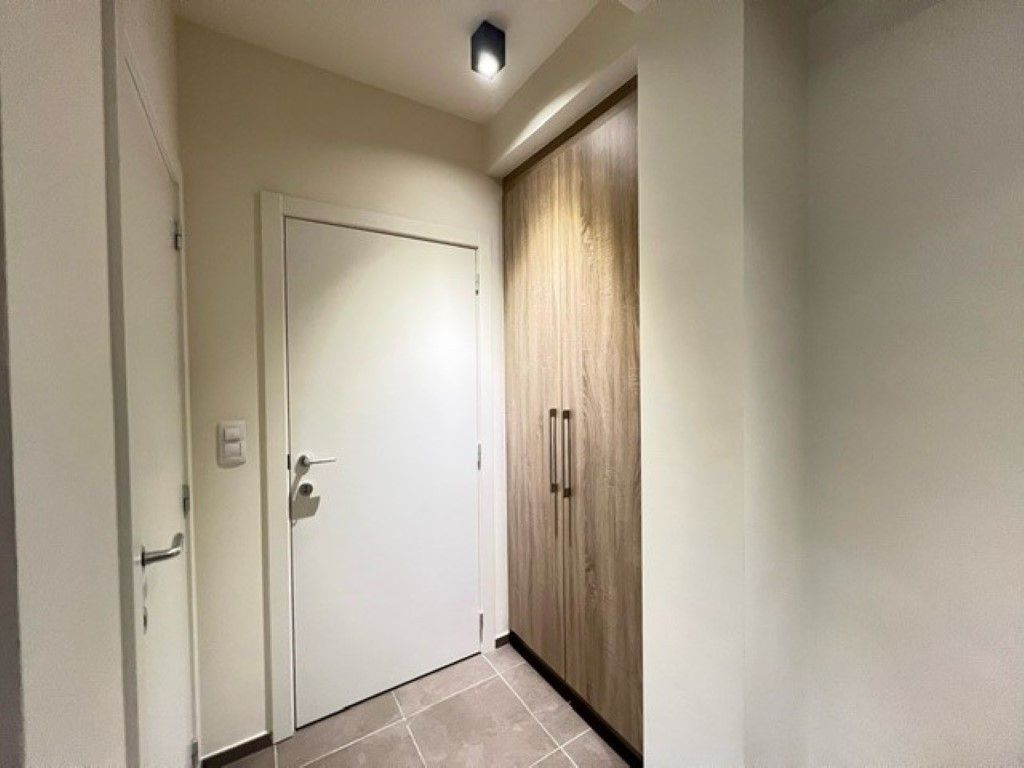Modern gelijkvloers appartement met terras foto 7