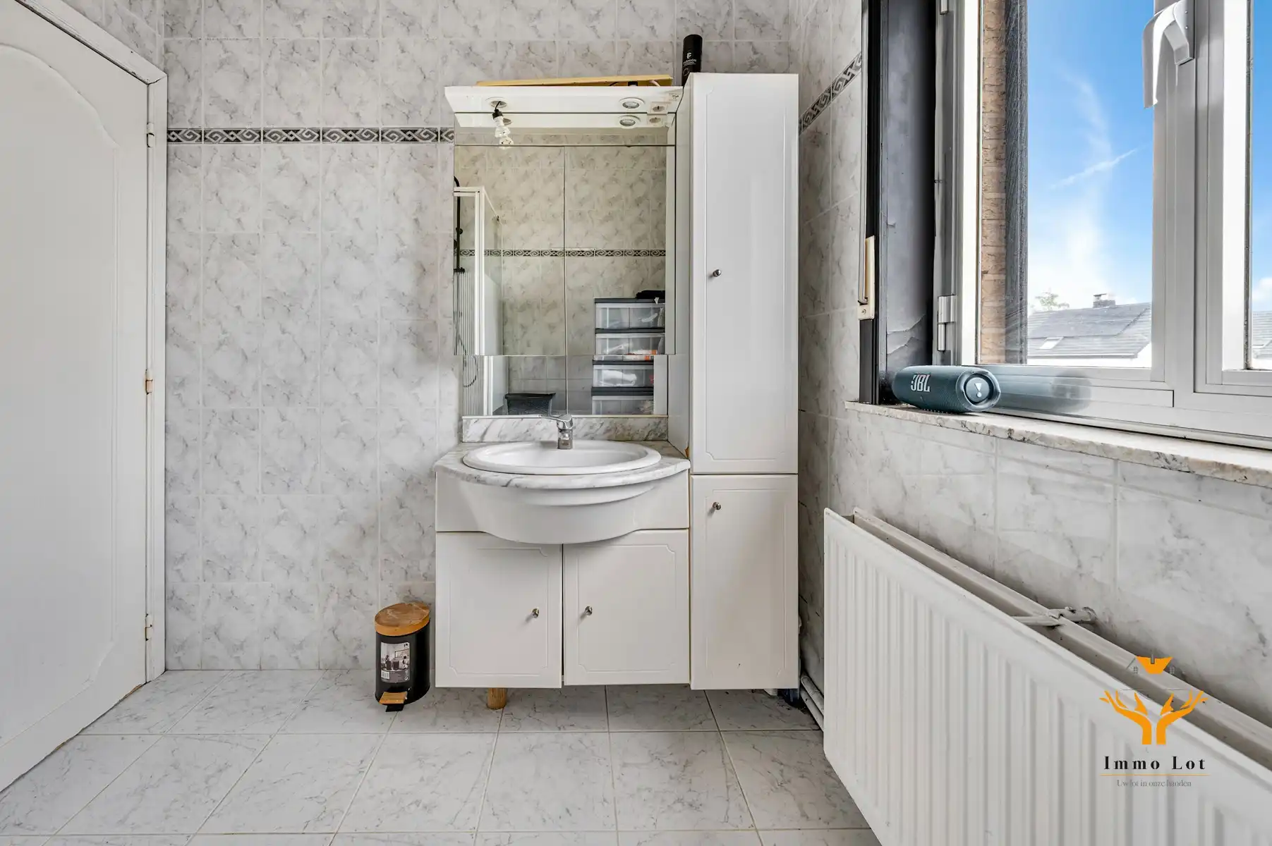 Halfopen bebouwing met tuin en garage in centrum Kalken foto 16