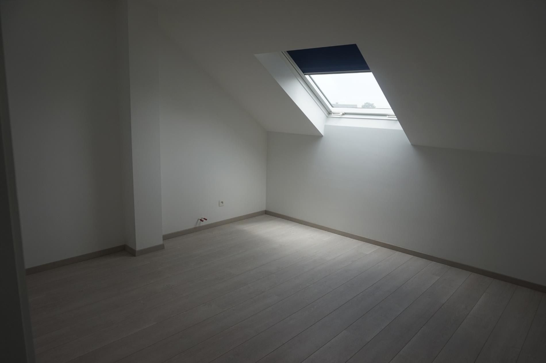 Ruime bel-étage woning met terras, garage en 3 slaapkamers in Lokeren foto 7