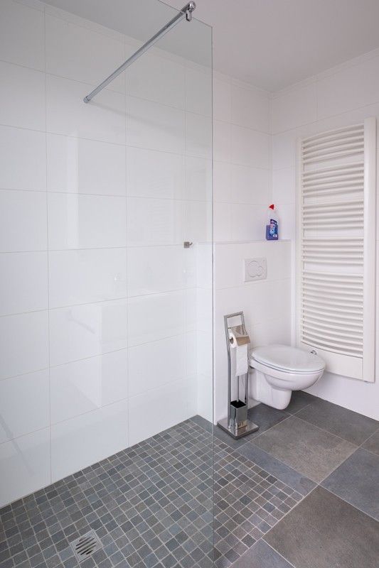 Ruim en luxueus appartement met 2,5 slaapkamers, 3 terrassen en 2 parkings in hartje Diepenbeek! foto 11