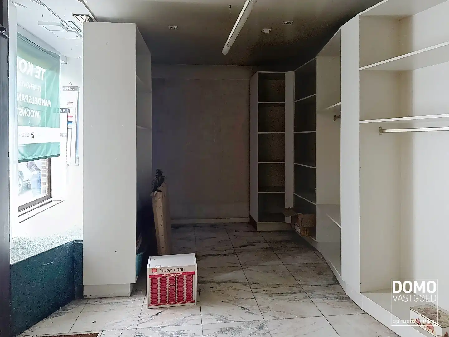 Te renoveren handelshuis gelegen in het centrum van Diepenbeek. foto 16