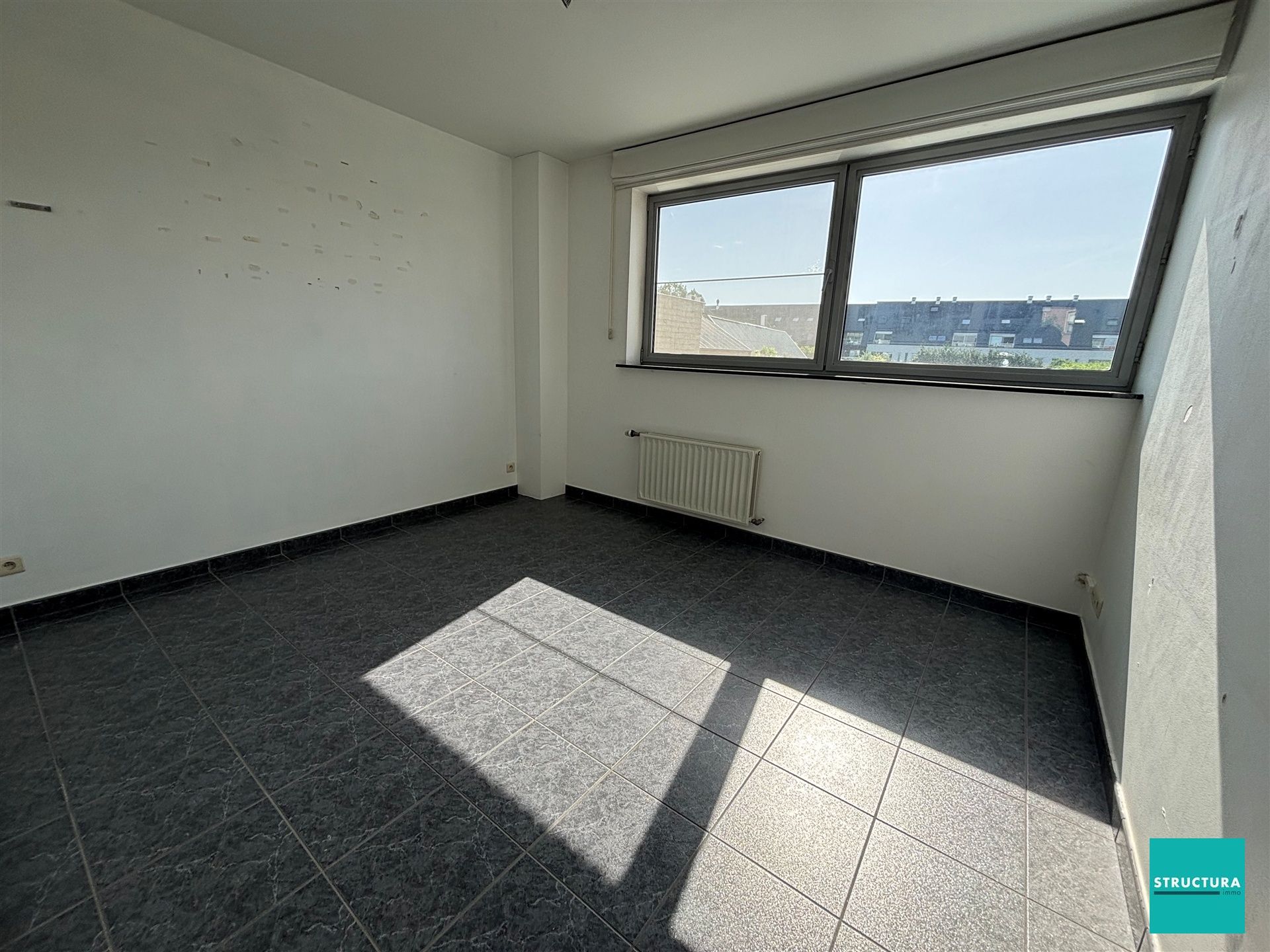 Appartement met 3 kamers en ruime garage in centrum Merchtem foto 10