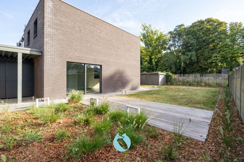 Deze woning is rustig gelegen in woonerf Brielken te Evergem foto 12