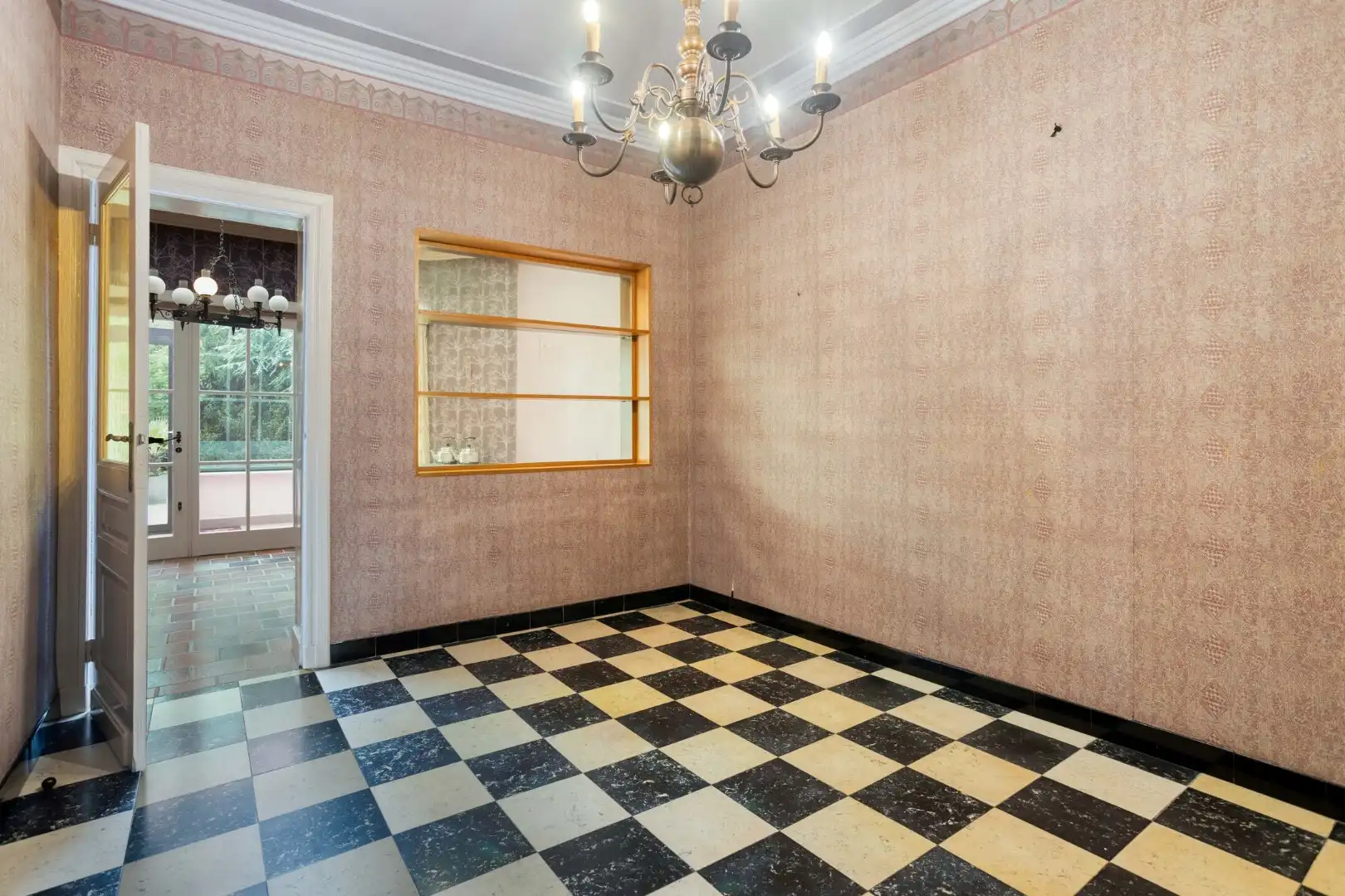 Te renoveren woning met tuin en garage in het centrum van Menen! foto 6