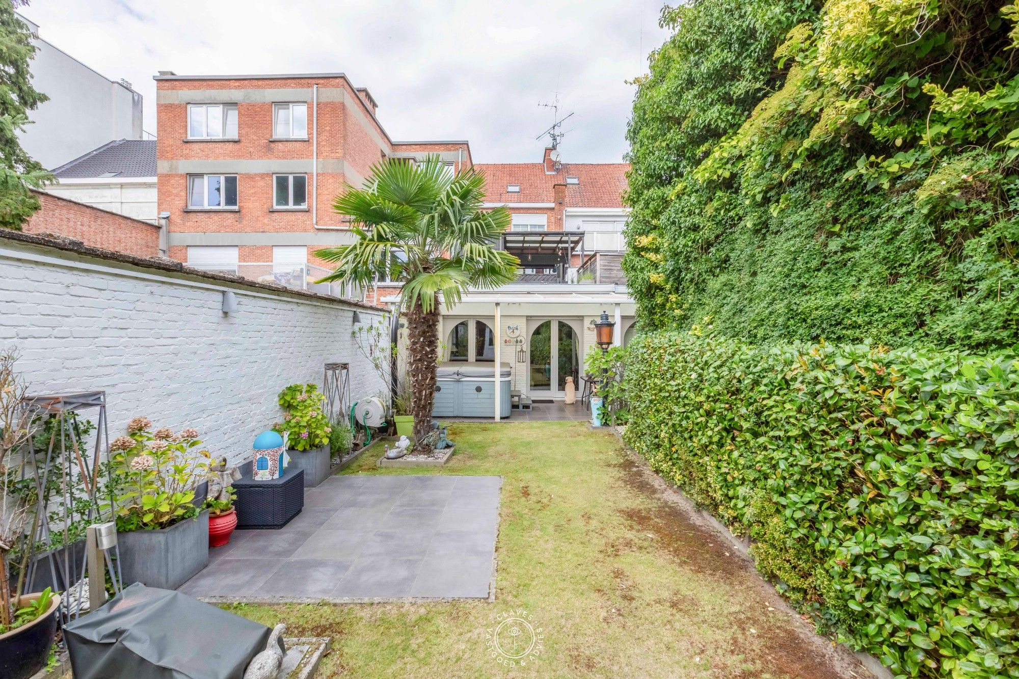 Opbrengsteigendom (ruime burgerwoning) bestaande uit 2 appartementen en garage foto 13