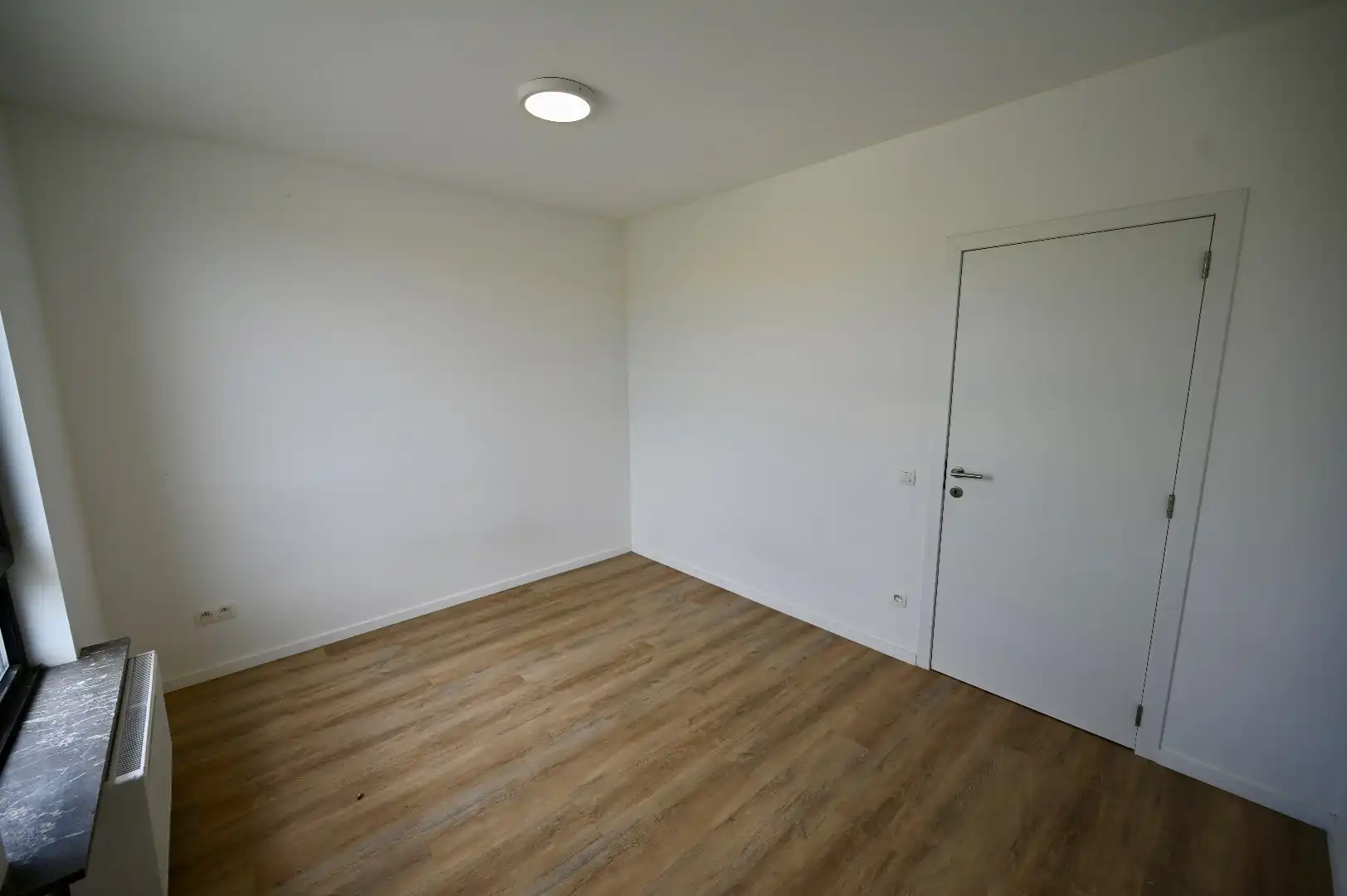 LICHTRIJK INSTAPKLAAR APPARTEMENT MET DUINENZICHT EN GESLOTEN GARAGEBOX foto 4
