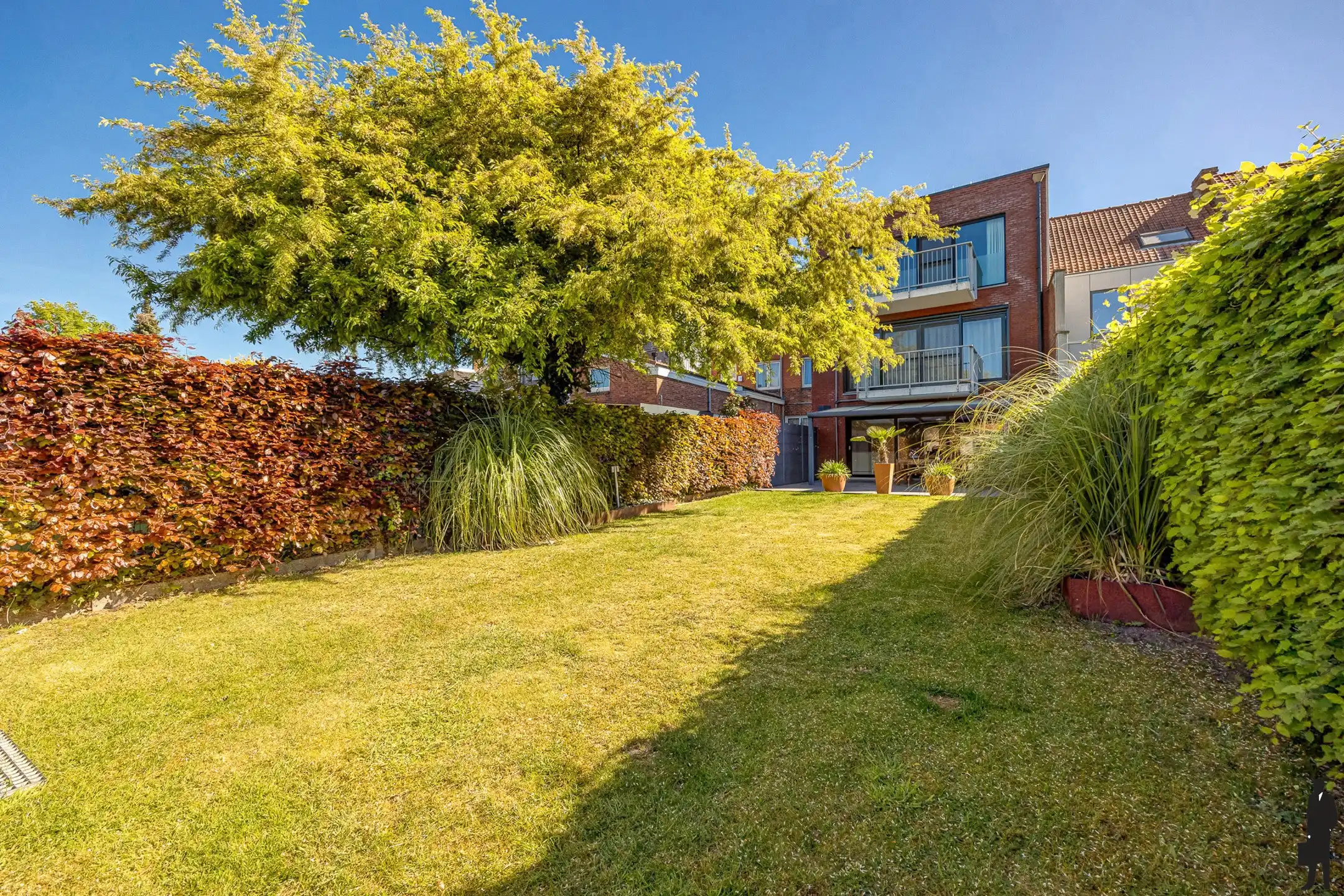 Recent gelijkvloers appartement met staanplaats en tuin foto {{pictureIndex}}