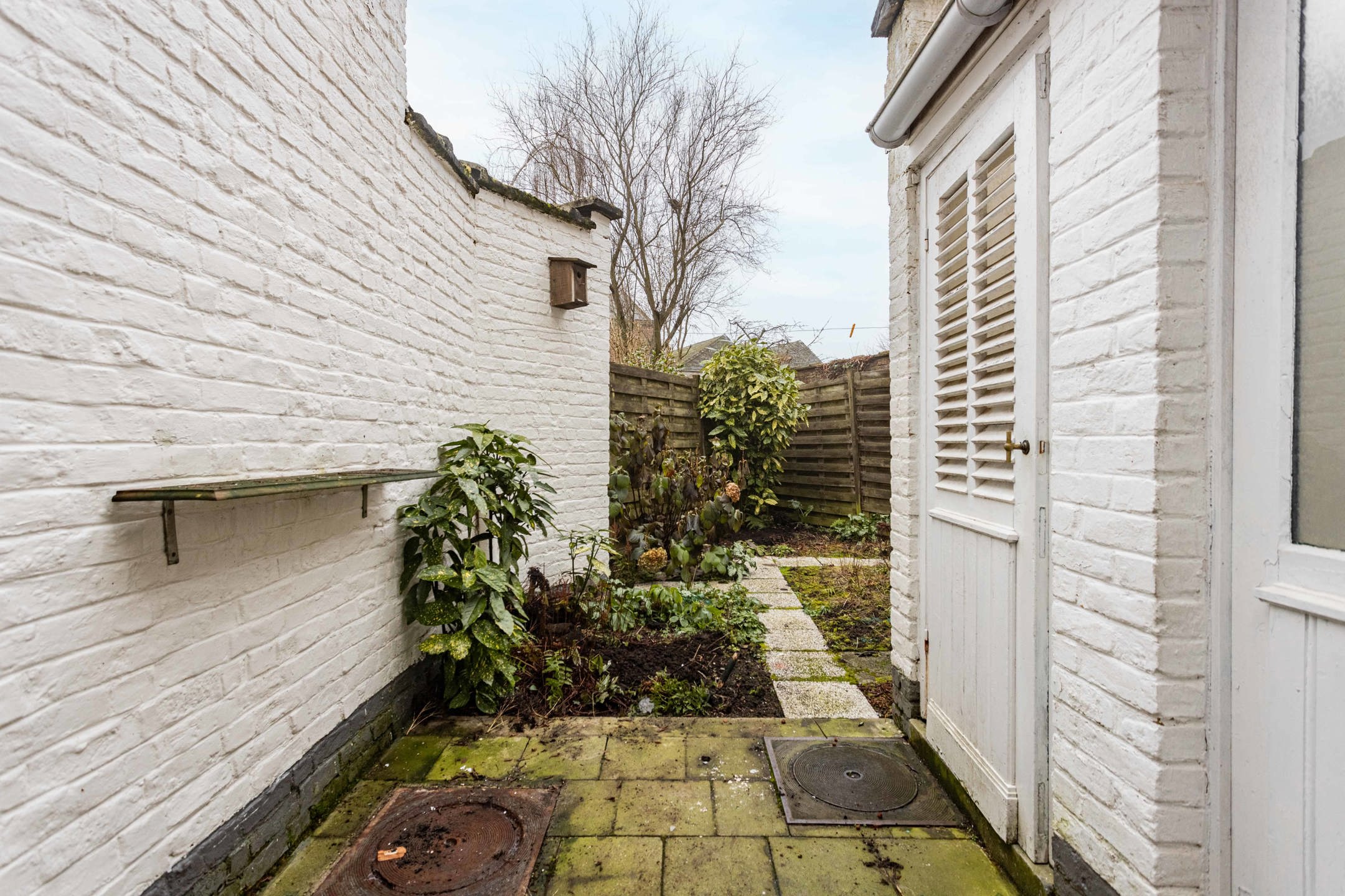 Charmante, te moderniseren stadswoning met tuintje. foto 22