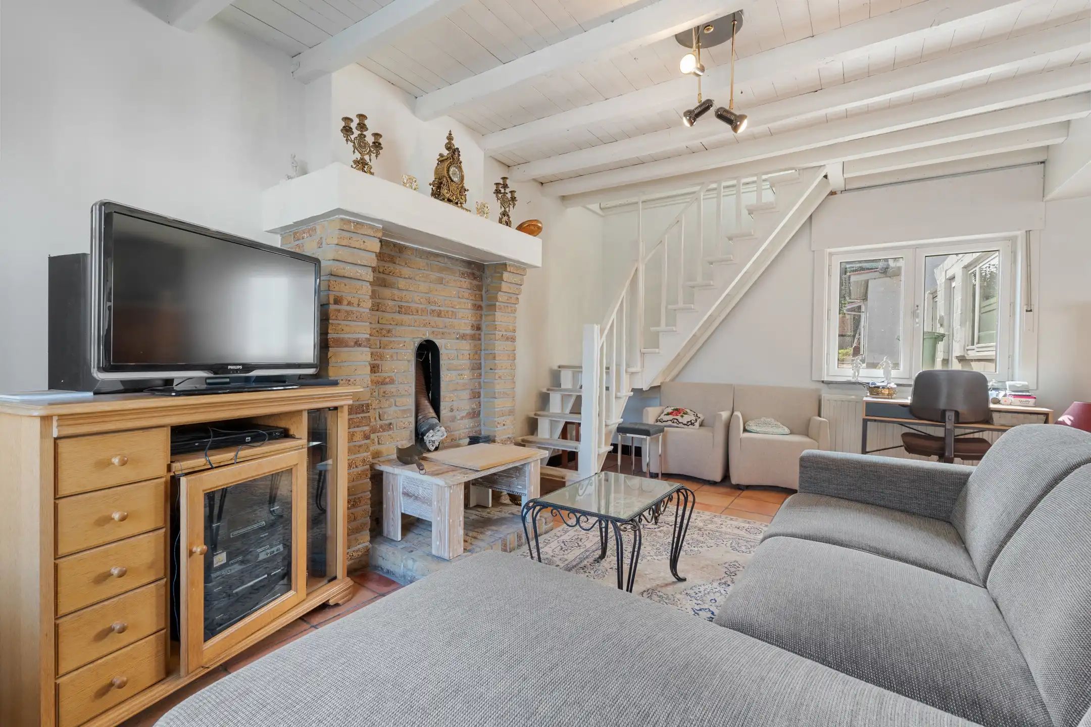 Charmante 3-gevelwoning met garage en tuin foto 9