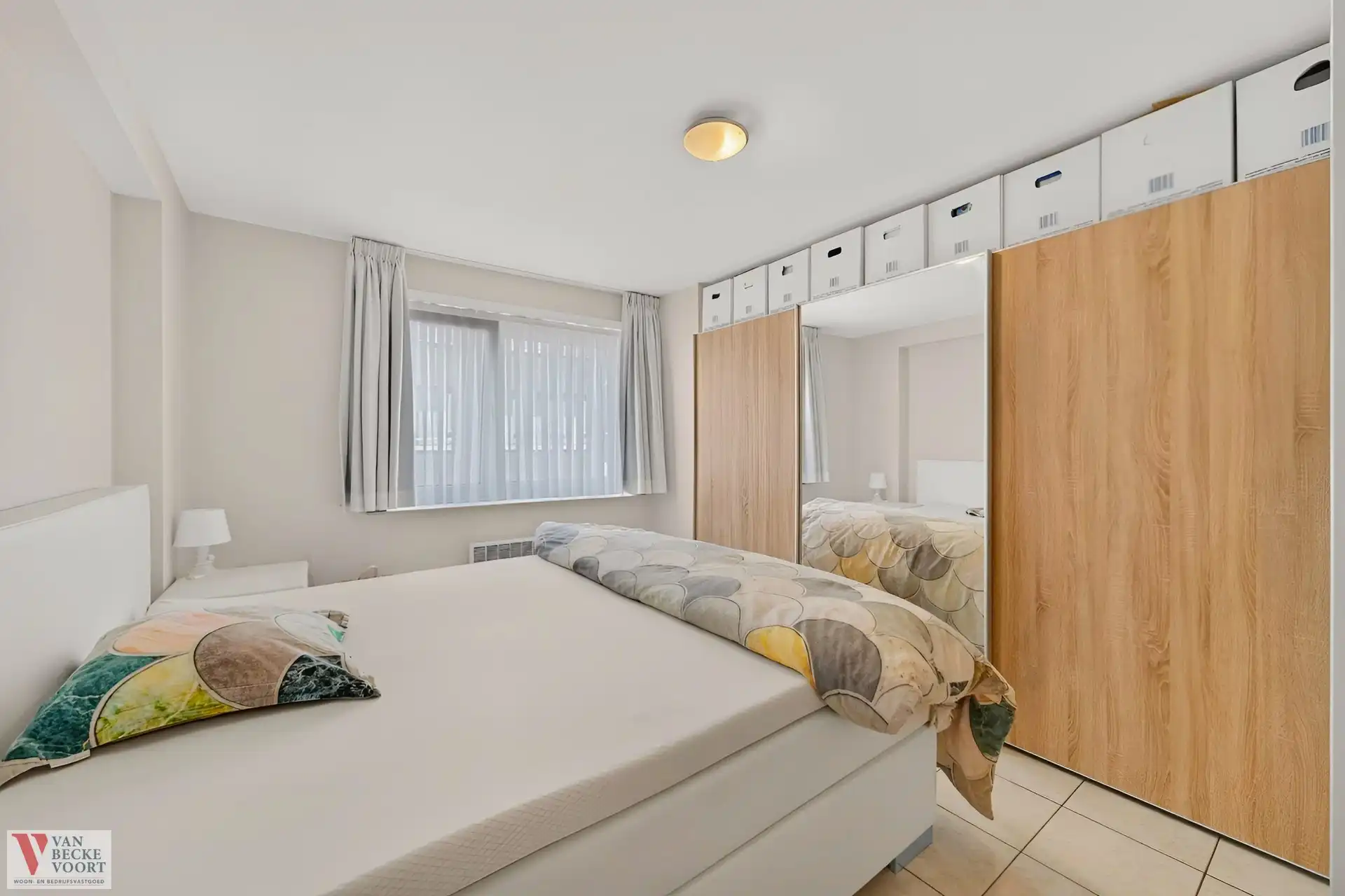 Lichtrijk 2-slaapkamerappartement met stadszicht foto 8