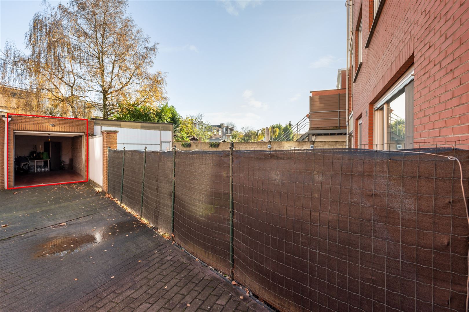 Rustig gelegen gelijkvloers appartement met 2 slaapkamers en garage. foto 15