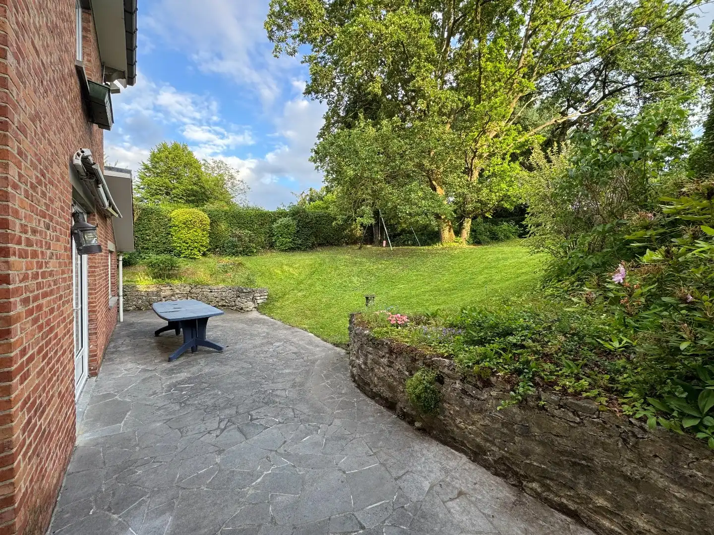 Charmante 3-gevelwoning met garage en tuin foto 19