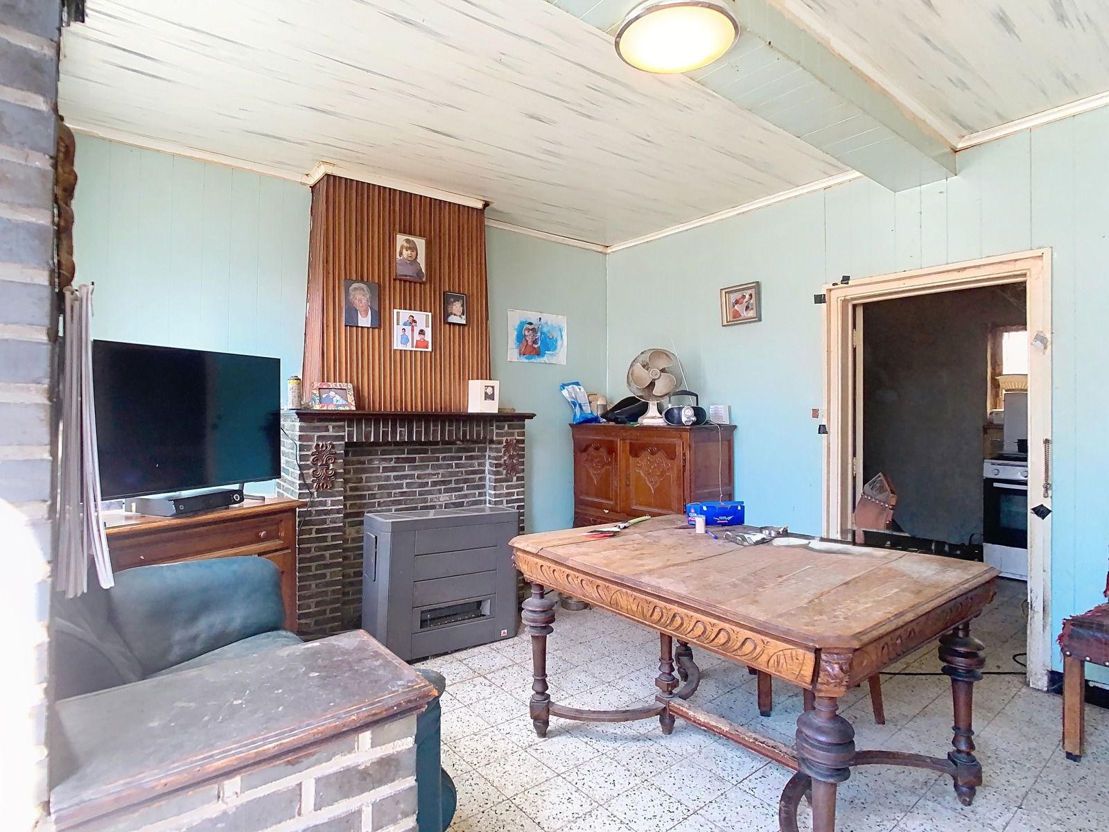 Rustig gelegen, volledig te renoveren woning met 1 SLPK! foto 2