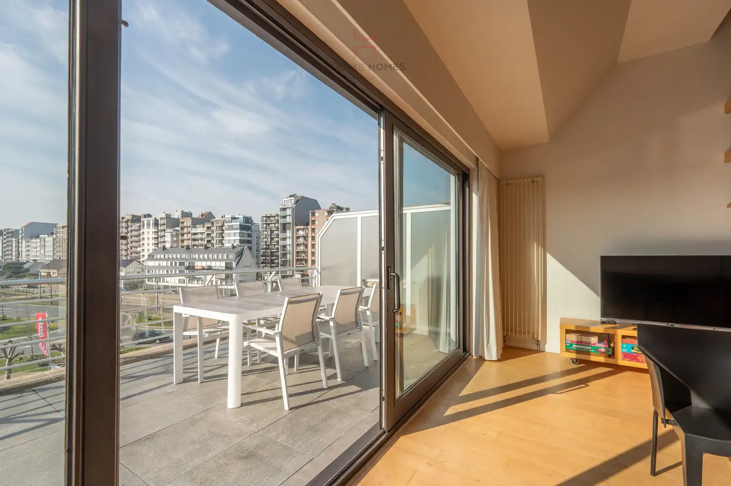 Licht en ruim duplexappartement met zonovergoten terras in Heist foto 4
