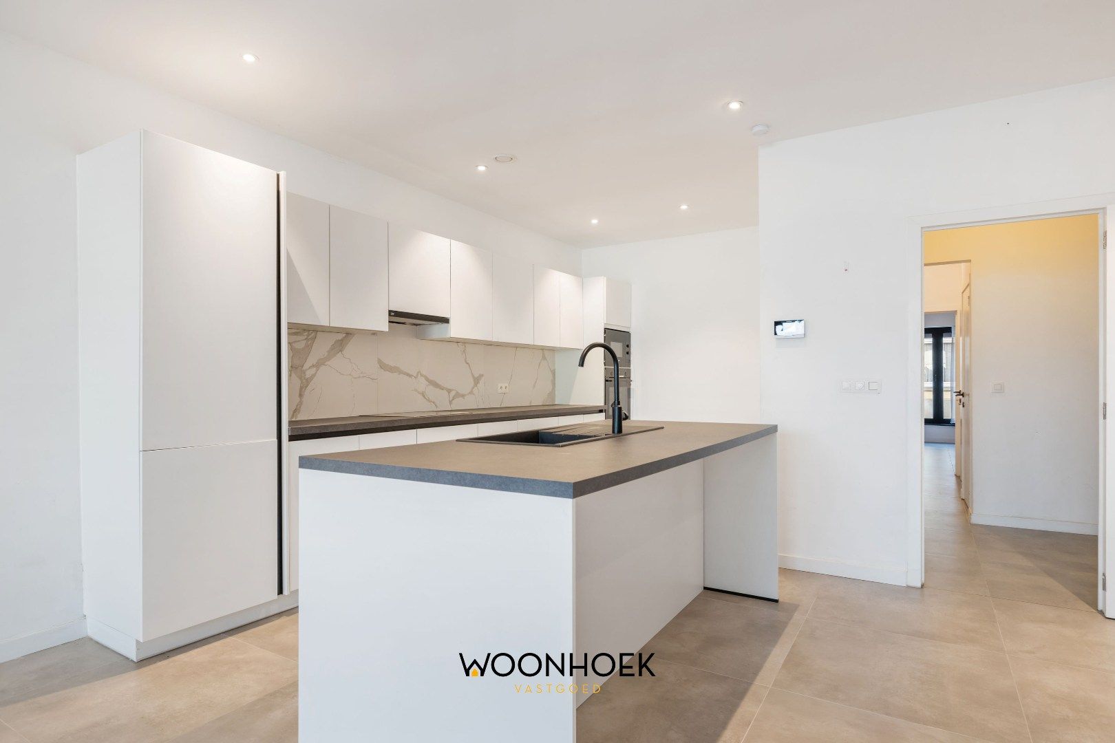 Nieuwbouw gelijkvloersappartement met tuin in centrum Lokeren foto 2