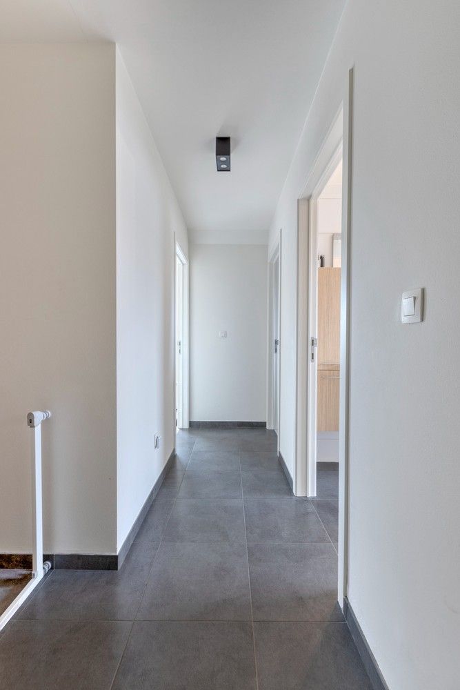 Instapklare en lichtrijke duplex met terras, garage én drie slaapkamers foto 5