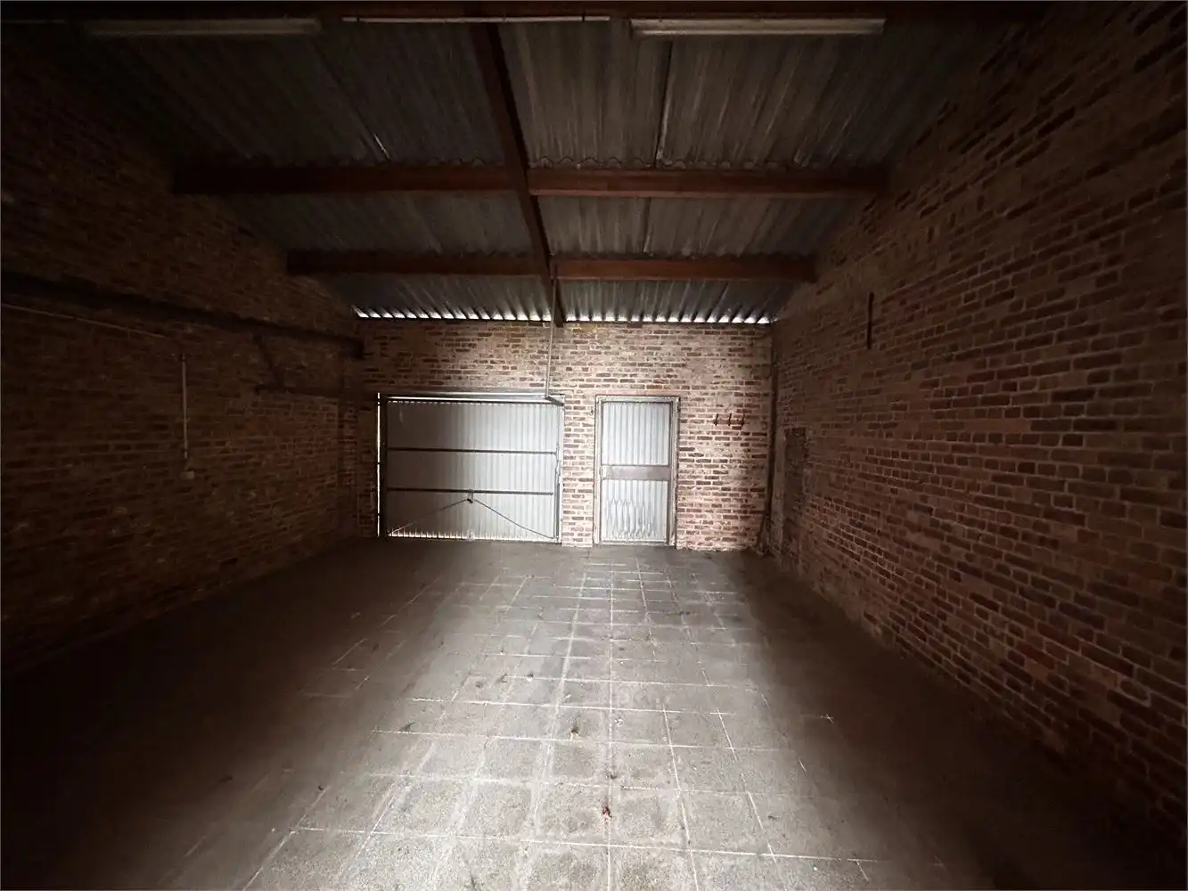 Te renoveren handelshuis met woonst foto 23