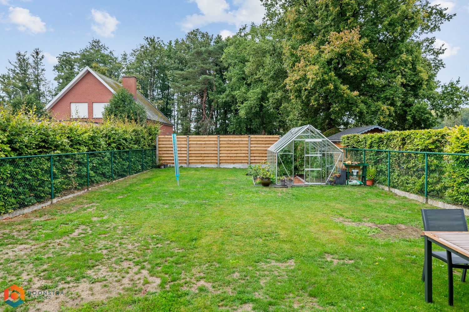Verzorgde woning met 2 slpkrs, leuke tuin en garage foto 23