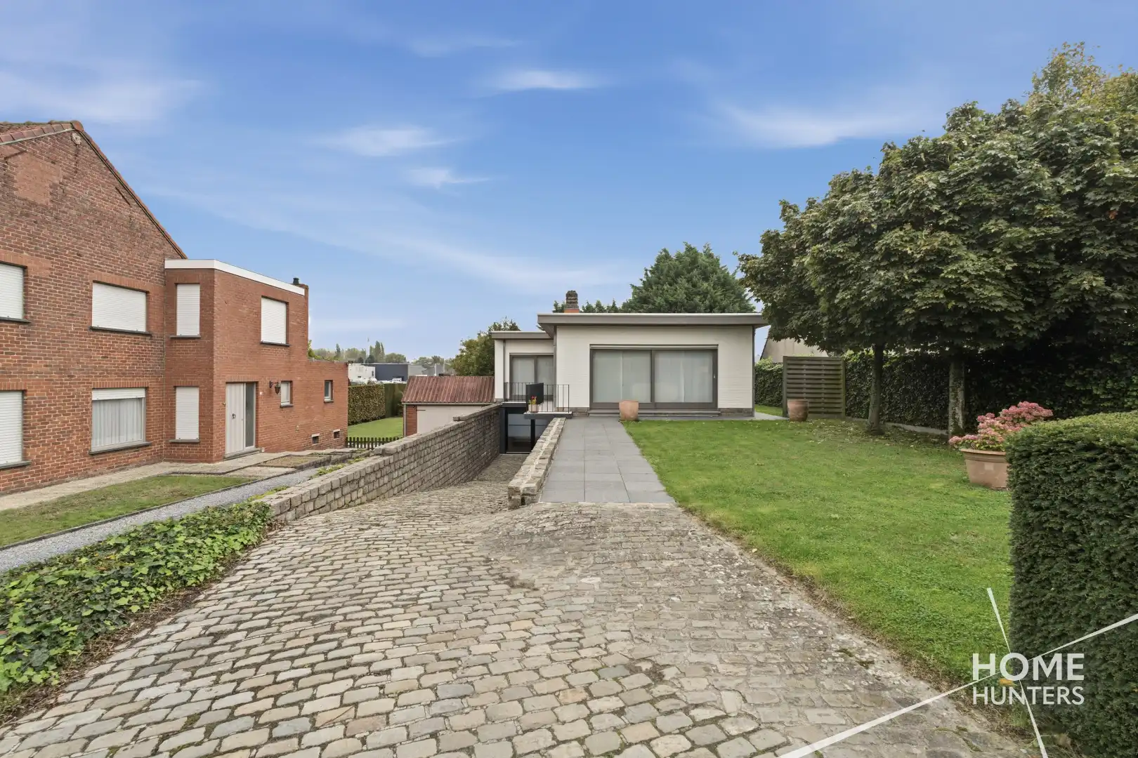 RUSTIG GELEGEN BUNGALOW MET RUIME TUIN EN VEELZIJDIGE KELDERRUIMTE foto 31