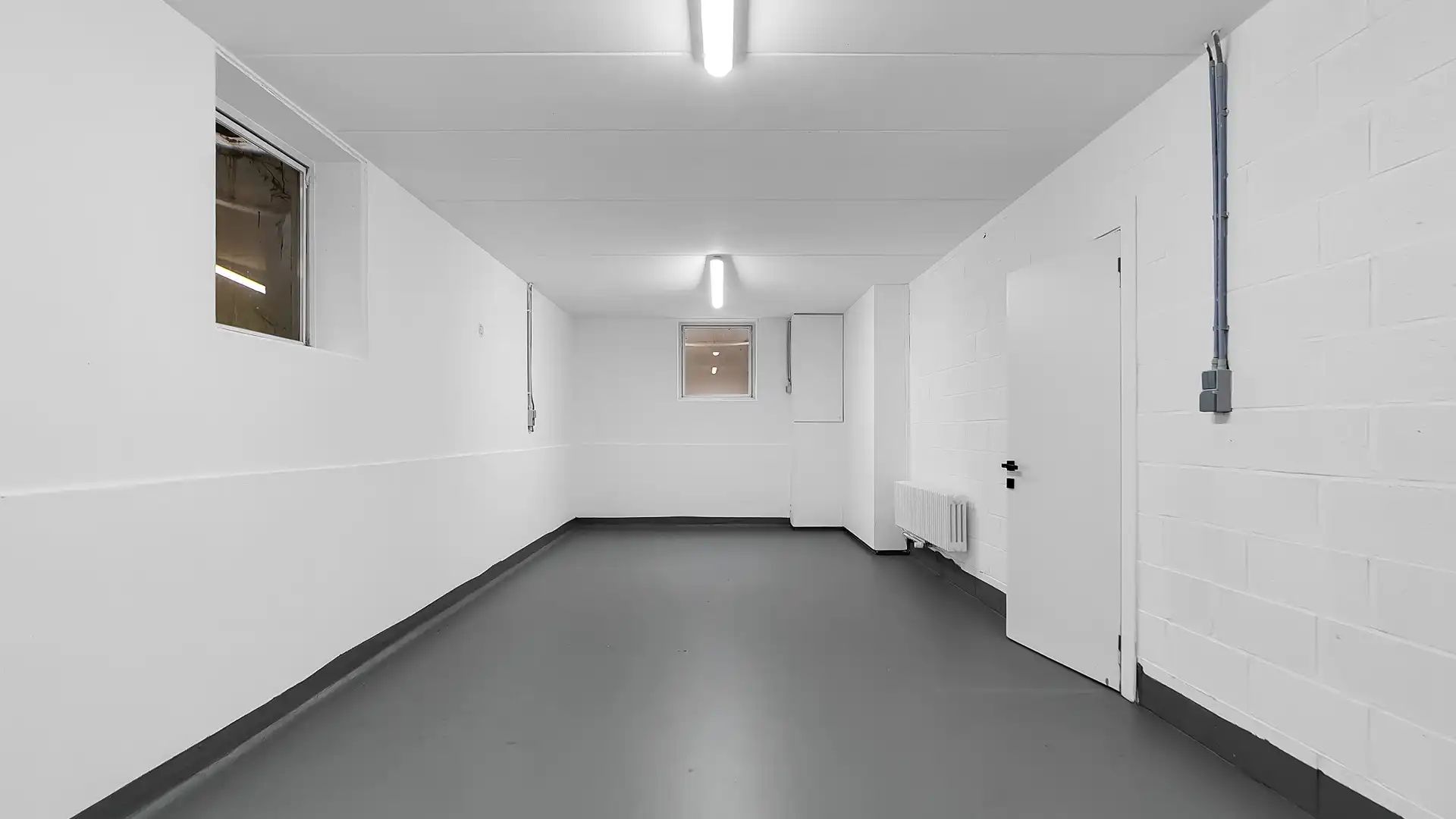 Gelijkvloers appartement met privatieve tuin, volledige onderkelderd en uitzonderlijk gunstig EPC foto 12