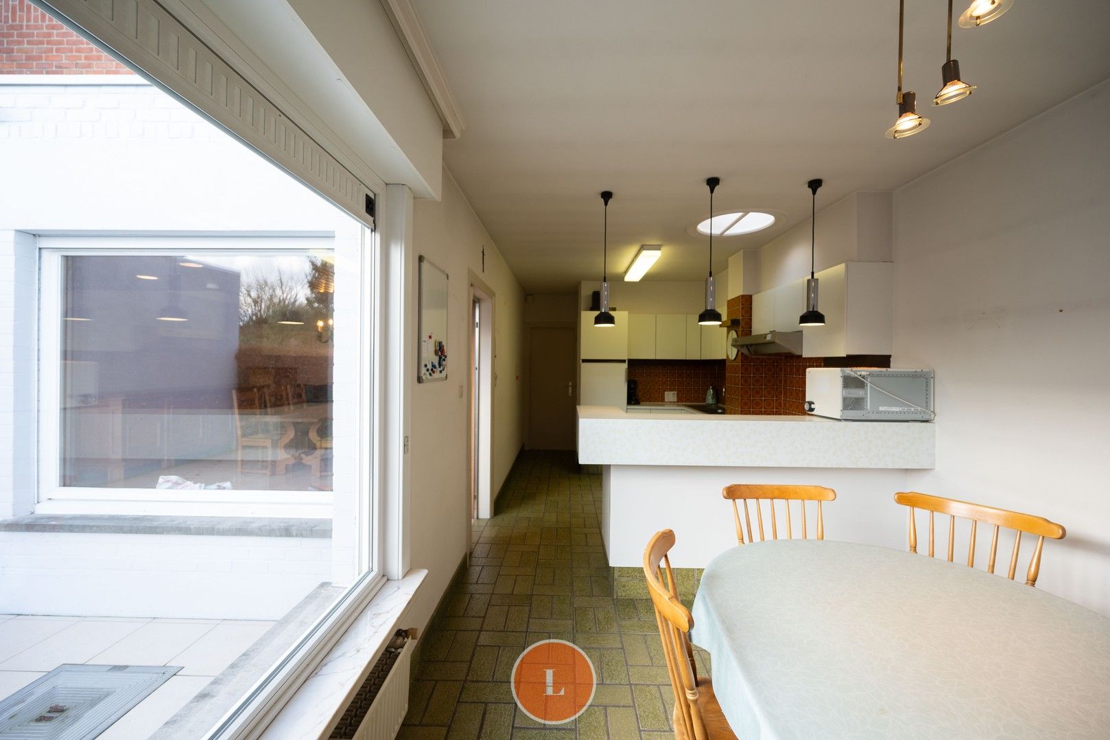 Op te frissen woning vlakbij het centrum van Wevelgem! foto 7