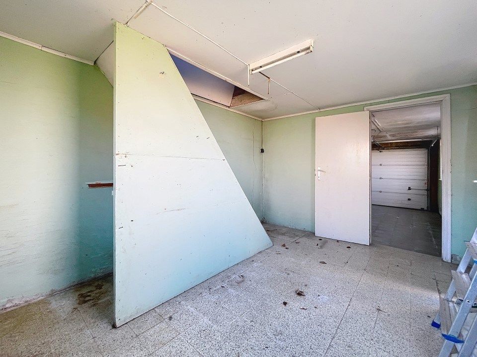 Karaktervolle alleenstaande woning met garage én tuin  foto 11