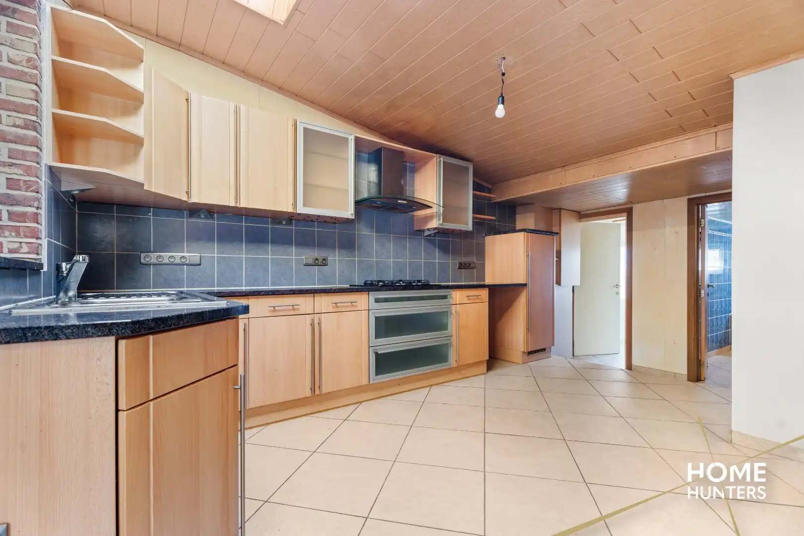 Praktische woning met 2 slaapkamers en uitgestrekte tuin in het rustige Wijtschate foto 6