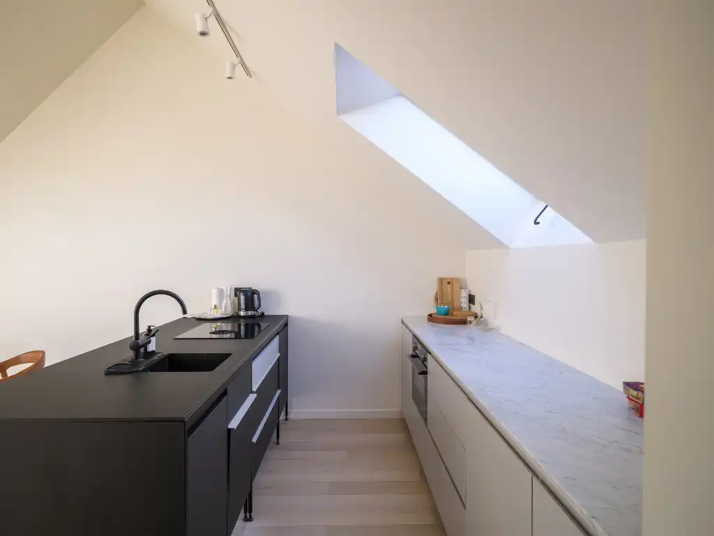 Architecturaal 3-­slaapkamerappartement met twee terrassen in het centrum van Gent. foto 5