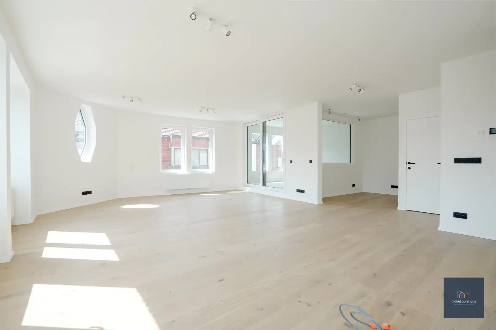 Stijlvol gerenoveerd duplex 3 slaapkamerappartement  met terras foto 4