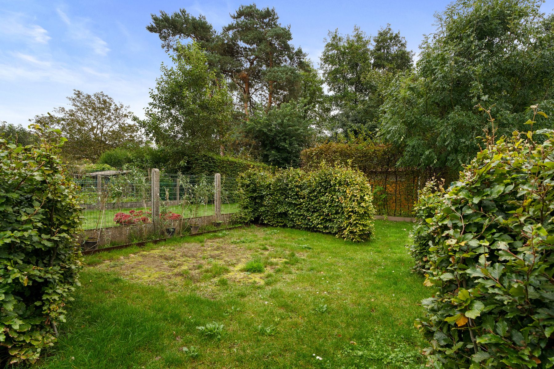 Gezellige gezinswoning met zonnige tuin in residentiële wijk foto 10