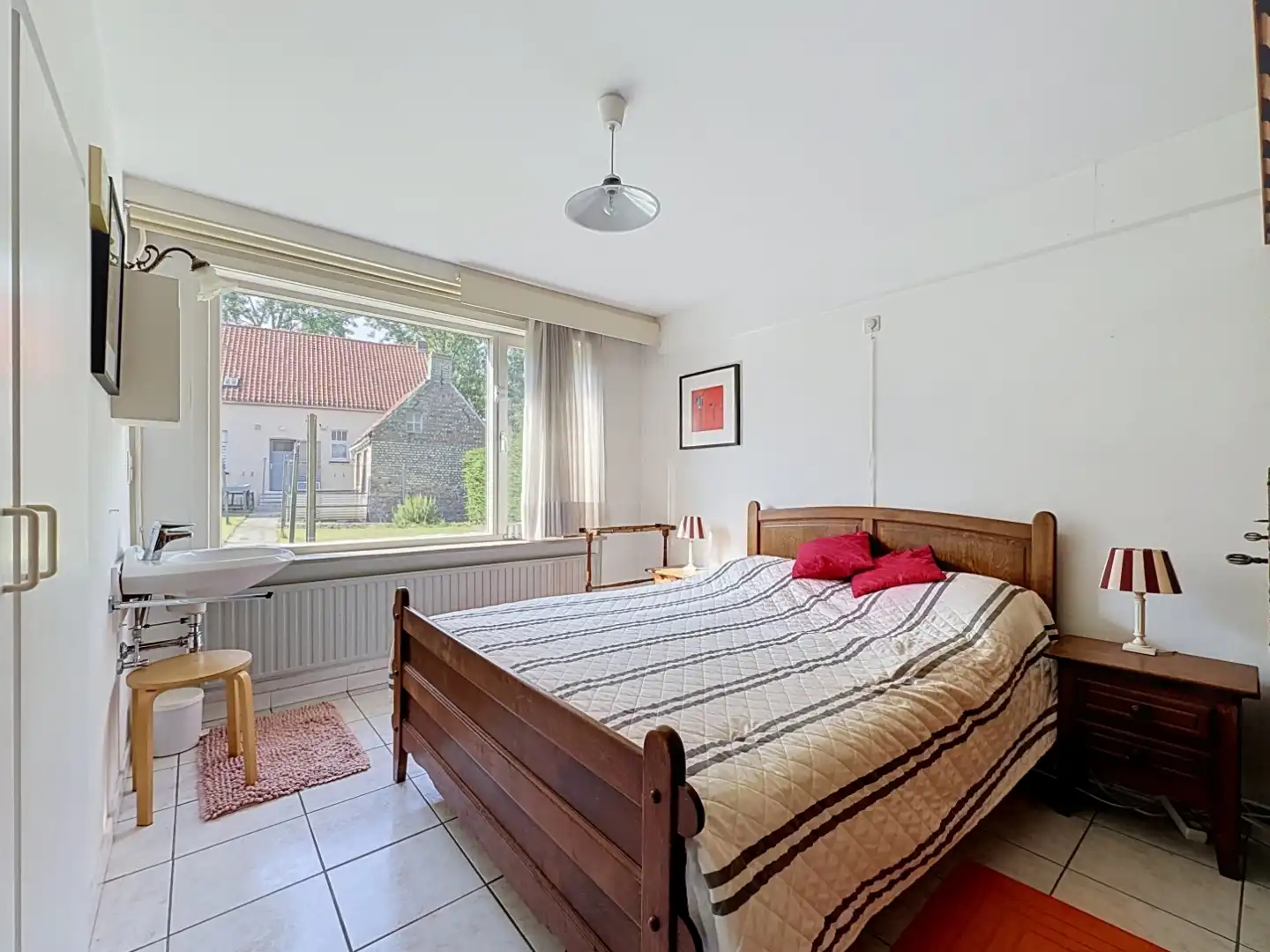 Ruime en zongerichte woning te koop te Wulpen. foto 11