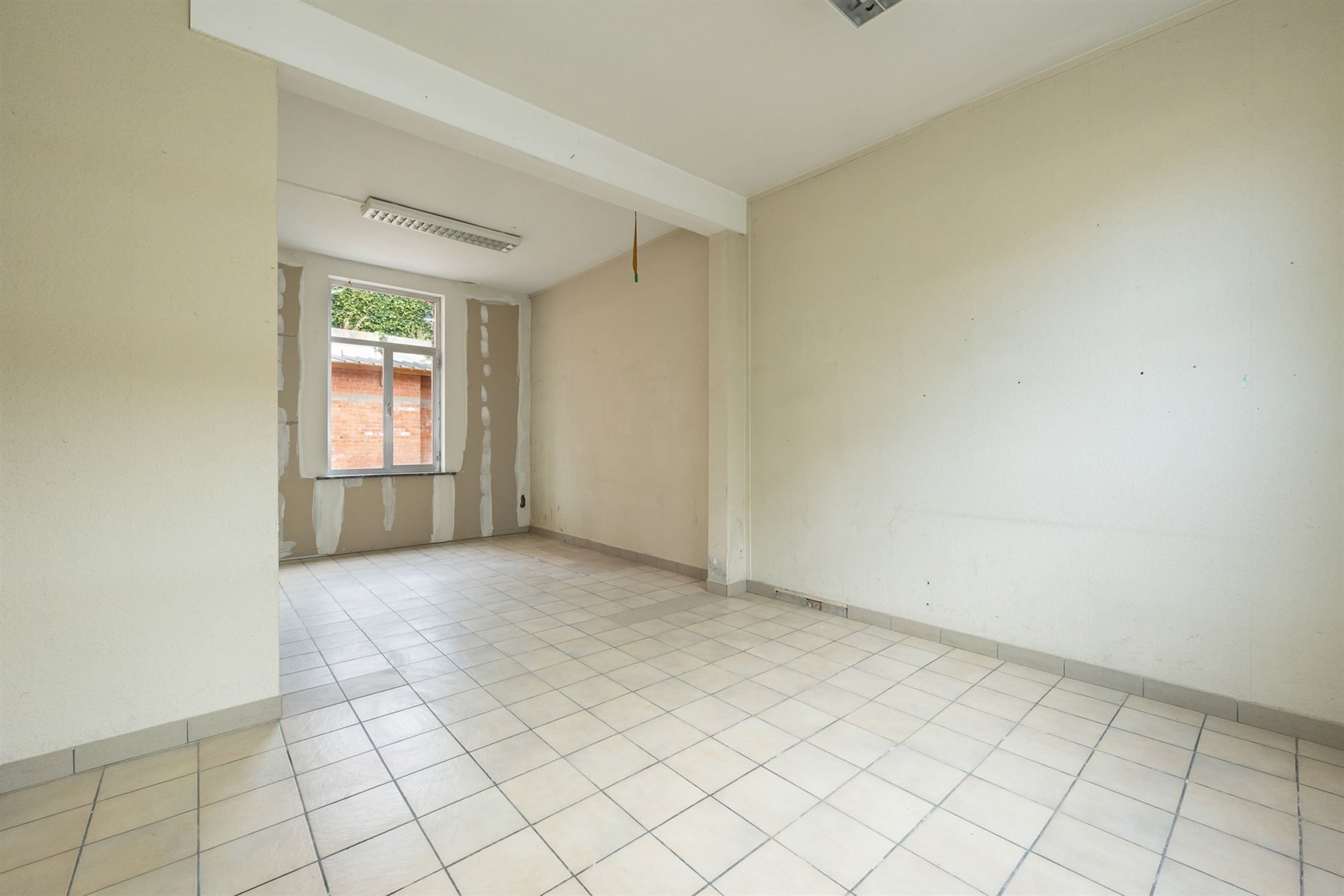 Gunstig gelegen renovatiewoning met 2 tot 4 slaapkamers foto 4