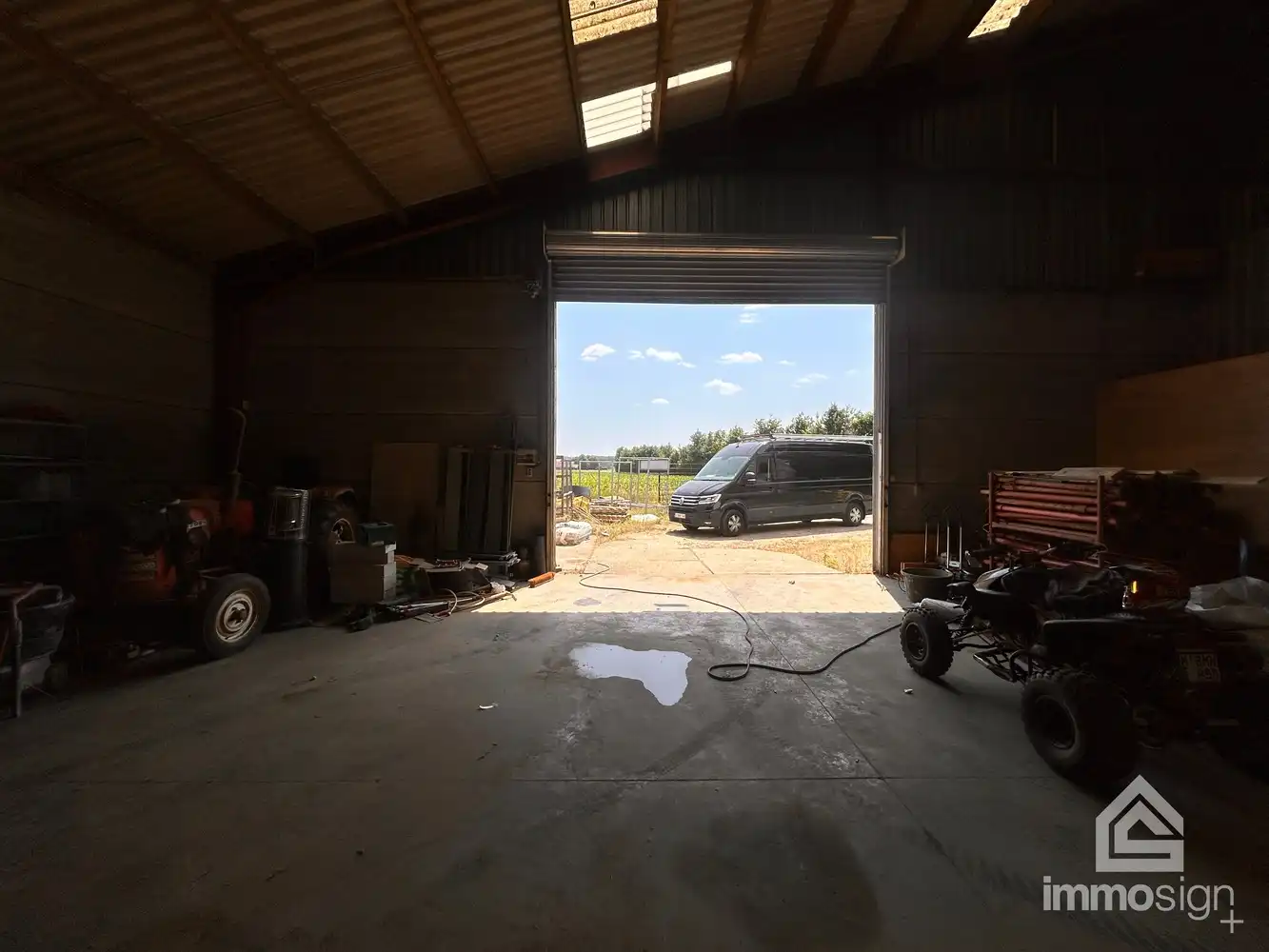 Loods van 180 m² ter opslag met grote automatische garagepoort te Bocholt! foto 7