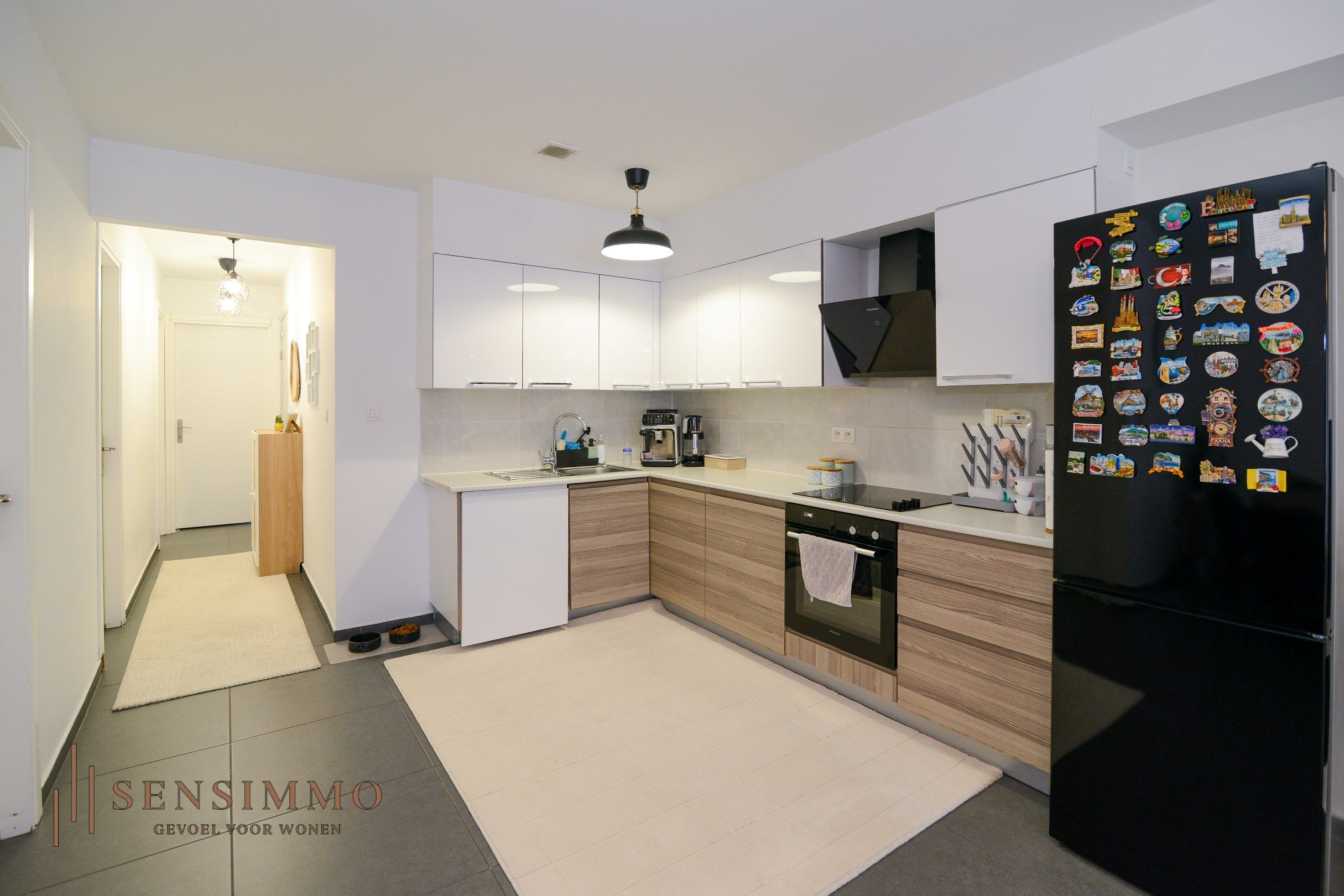 Gelijkvloers tweeslaapkamerappartement met tuin, parking en kelderberging foto 8