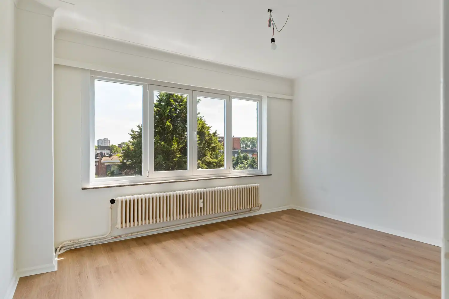 Licht op te frissen appartement met ruime living van 40 m² en nieuwe keuken foto 11