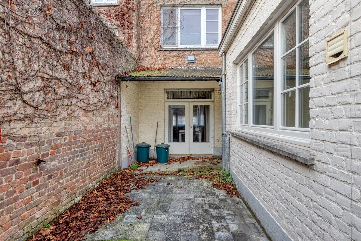 Charmante op te frissen woning met 4 slaapkamers en stadstuintje! foto 14